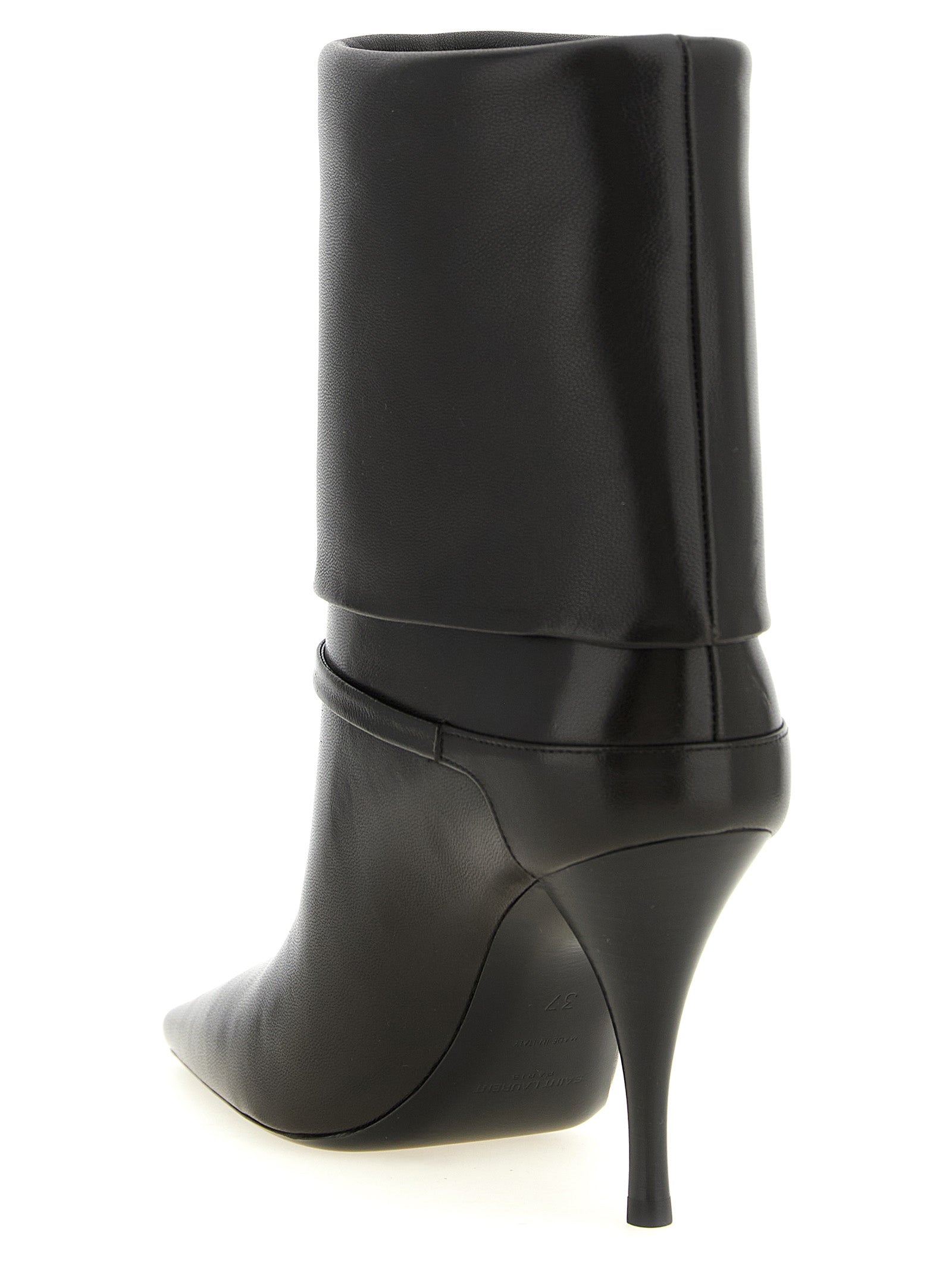 Elevate your style with the Saint Laurent Niki ankle boots, crafted from sumptuous lamb leather, embodying timeless elegance and audacious sophistication for the discerning fashionista.