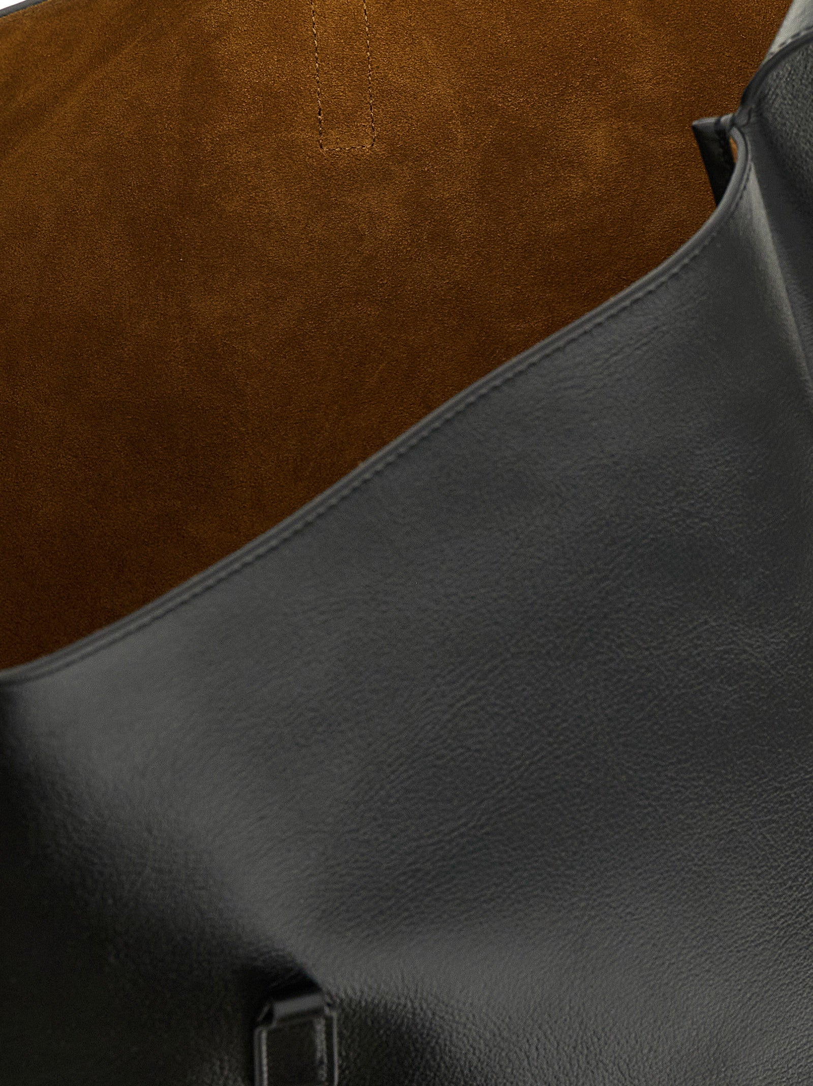 Indulge in the sophistication of the Saint Laurent Black Calfskin Shoulder Bag, a masterpiece of exquisite craftsmanship and timeless elegance, perfect for any modern wardrobe.
