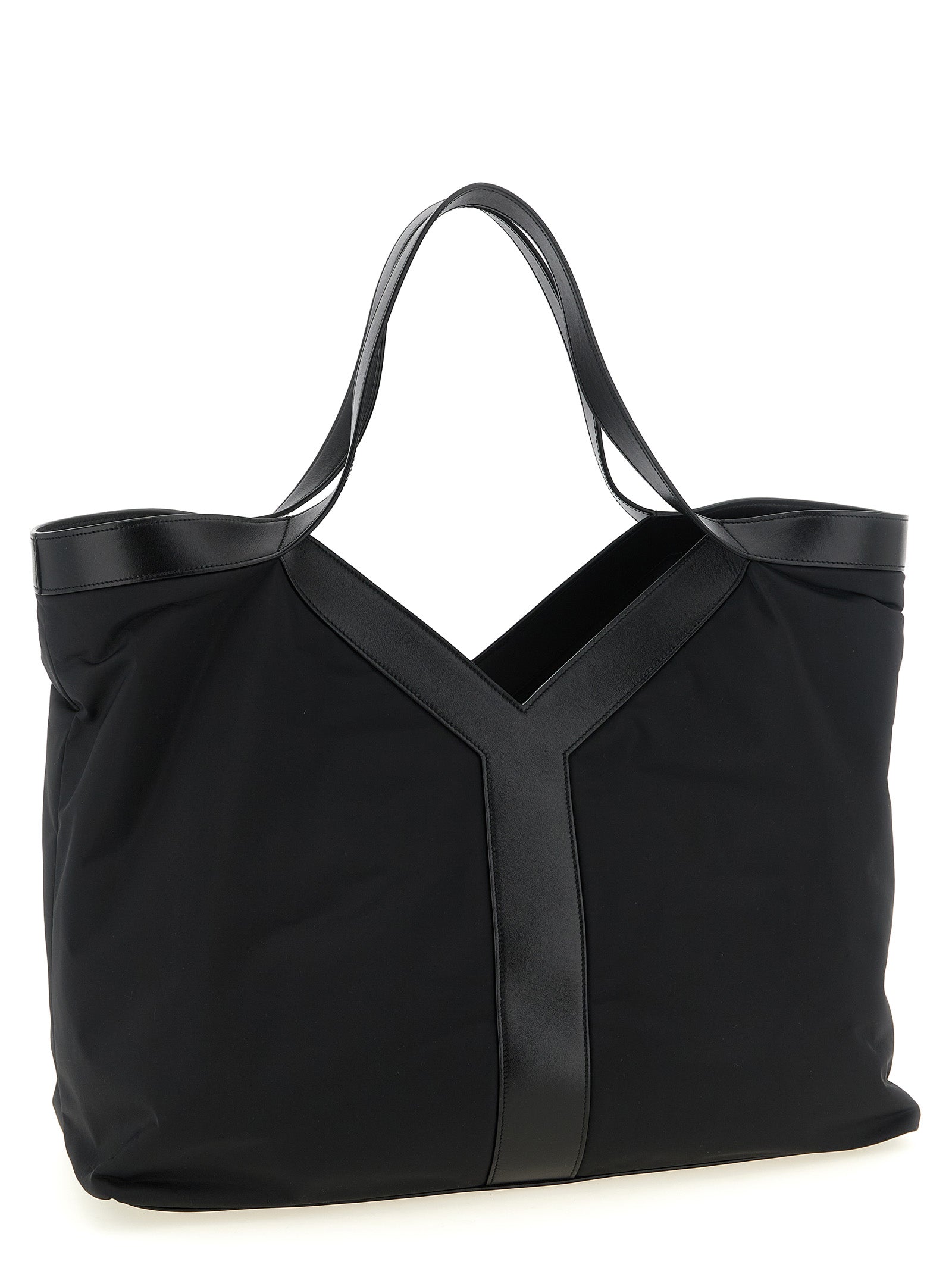 Discover the Saint Laurent Black Calfskin Tote Bag, a fusion of bold design and sustainable luxury, perfect for the discerning urban trendsetter.