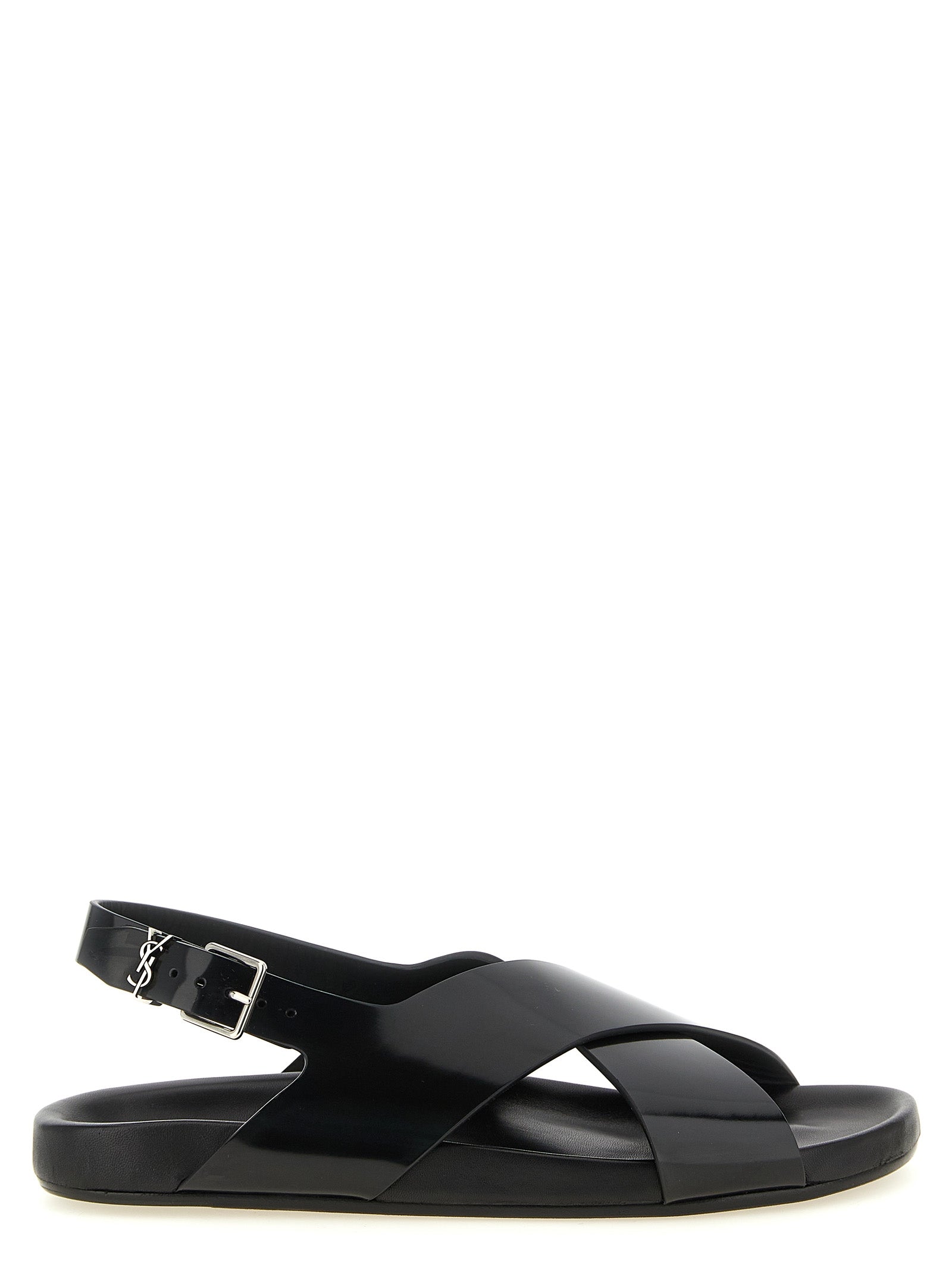 Step into the realm of luxury with Saint Laurent's Helios Black Calfskin Flat Sandals, where exquisite craftsmanship meets modern elegance for the discerning trendsetter.