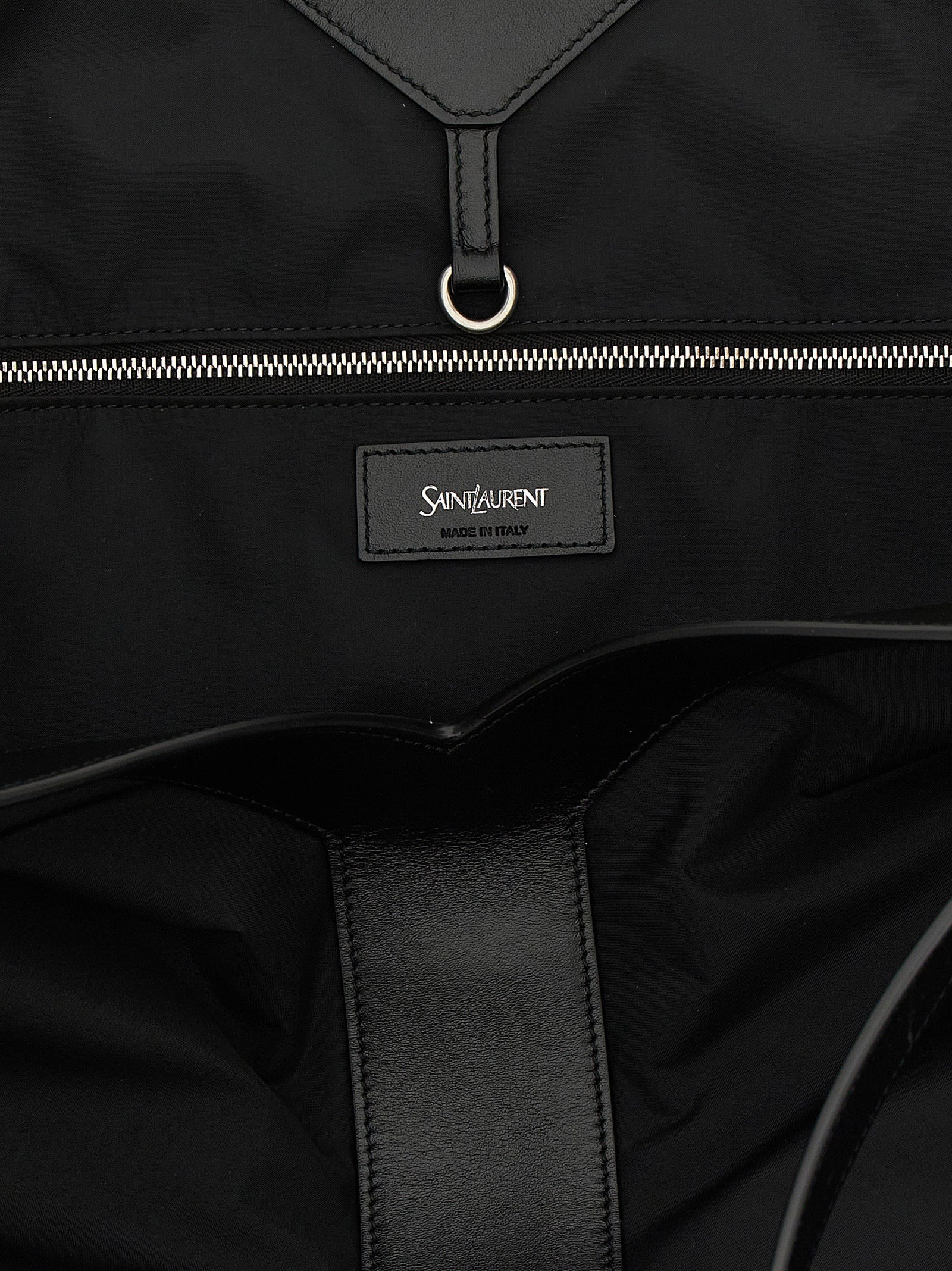 Discover the Saint Laurent Black Calfskin Tote Bag, a masterpiece of sustainable luxury and bold design, perfect for the discerning urban trendsetter.