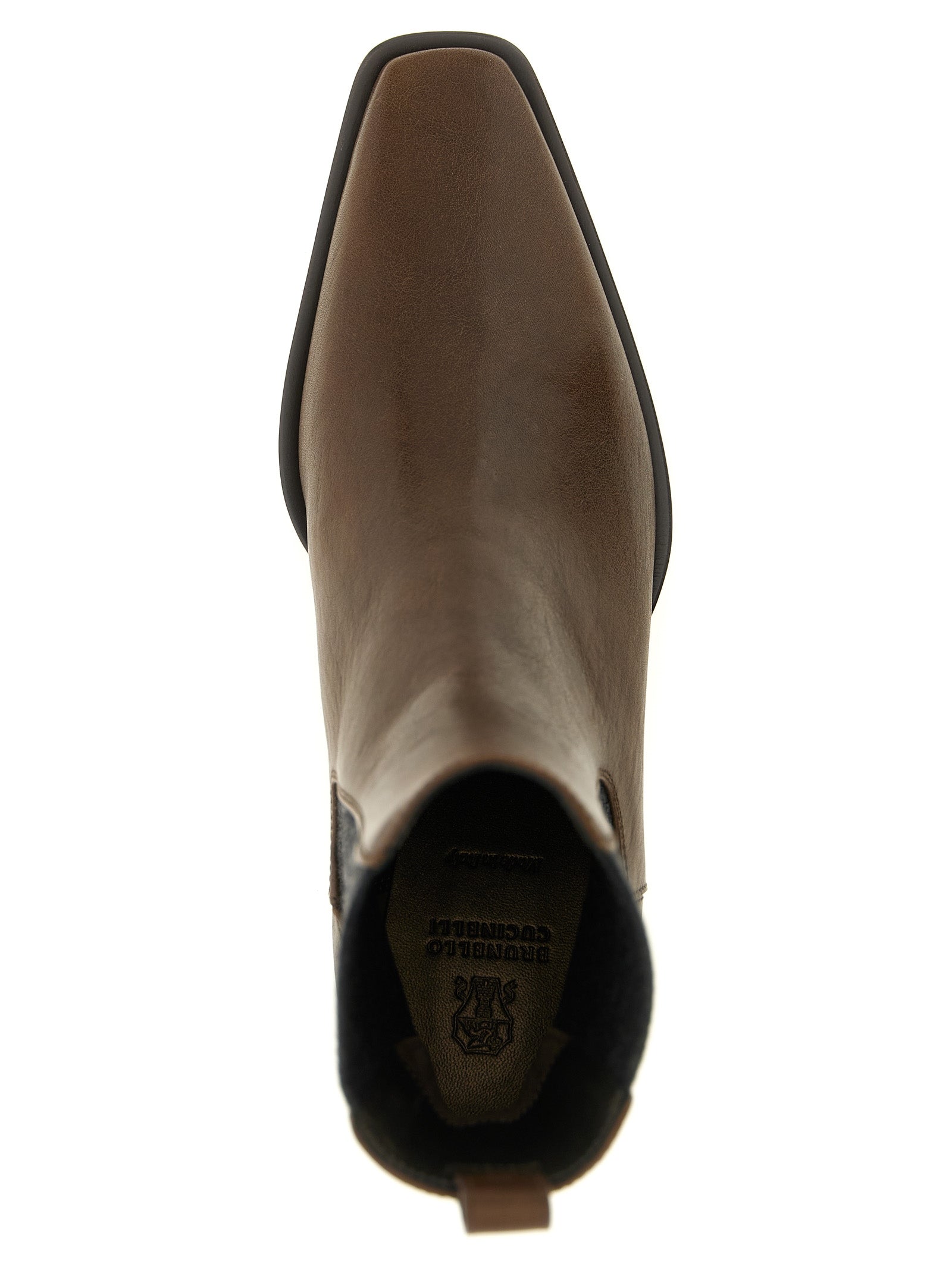 Elevate your style with Brunello Cucinelli's Brown Cowhide Chelsea Boots, where exquisite craftsmanship meets timeless elegance for a truly luxurious experience.