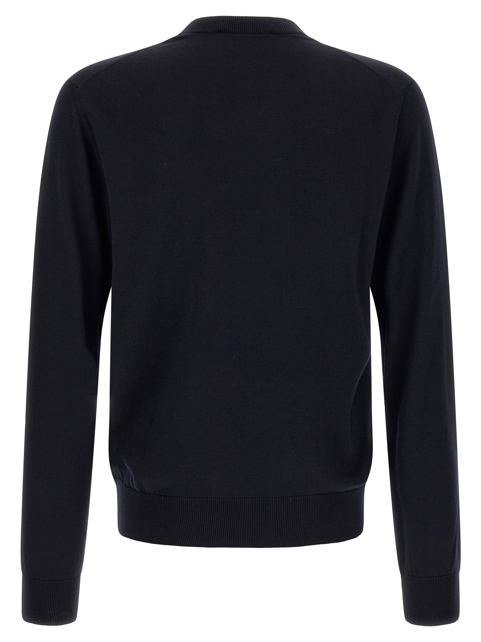 Indulge in the elegance of the Dolce & Gabbana Blue Virgin Wool Cardigan, a masterpiece of Italian craftsmanship that seamlessly blends tradition with modern sophistication.