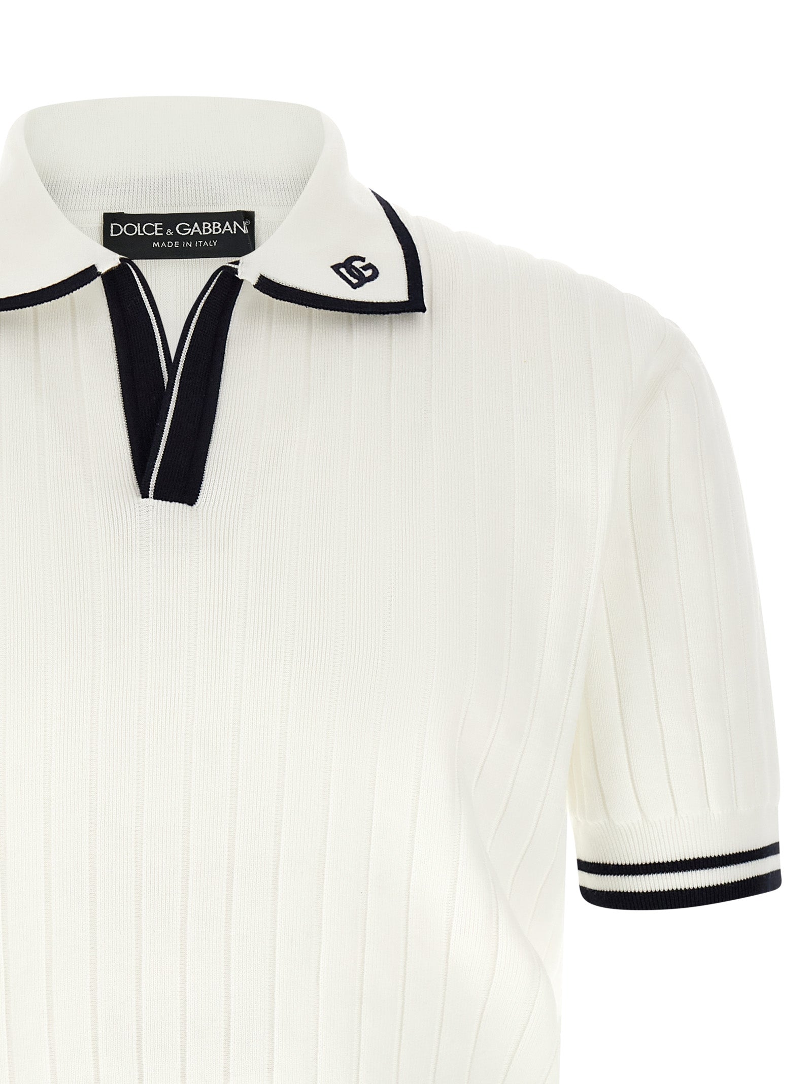 Discover the Dolce & Gabbana Bicolor Cotton Polo Shirt, a fusion of elegance and comfort crafted from luxurious cotton, perfect for the discerning individual seeking timeless style.