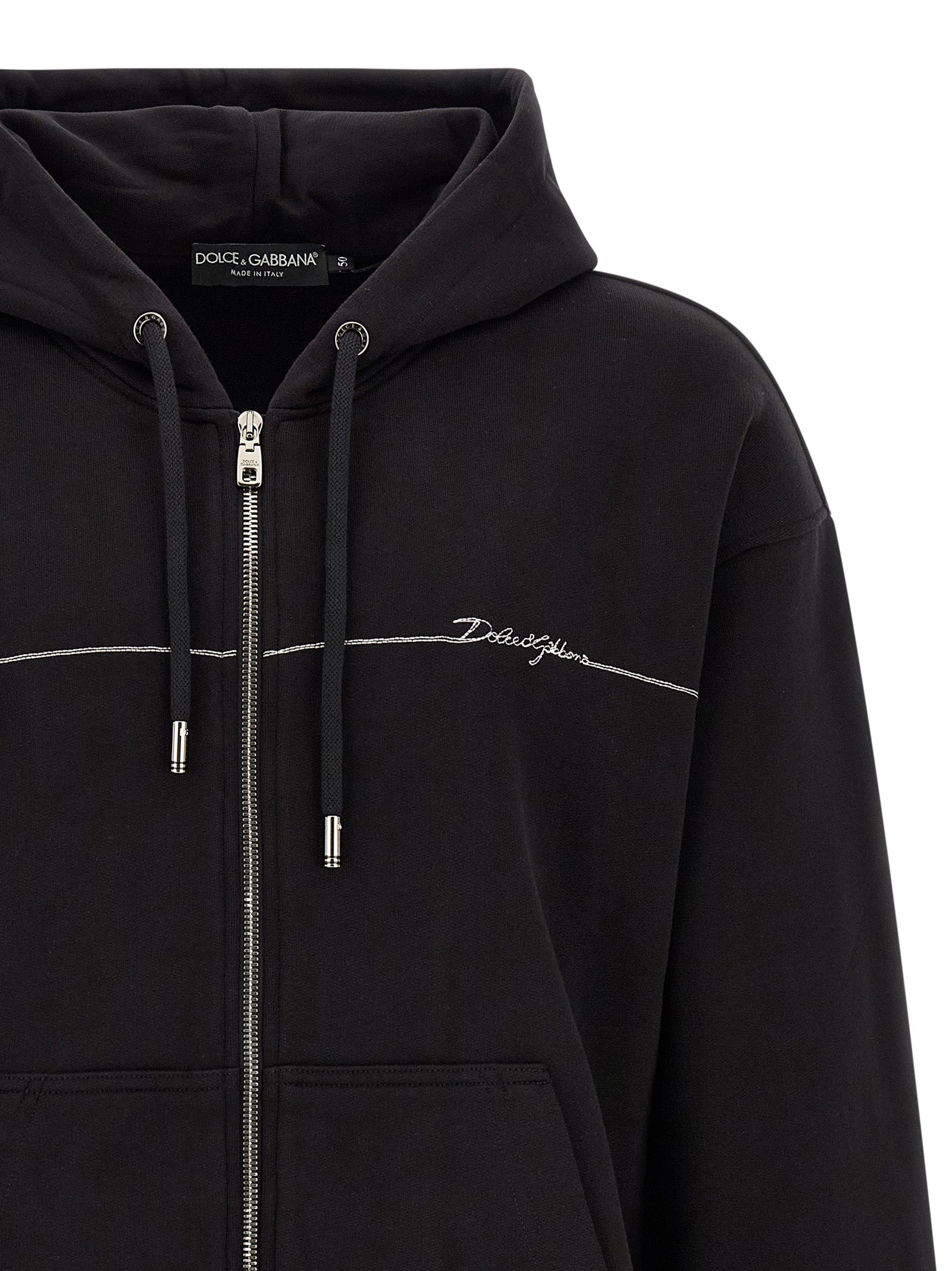 Indulge in the timeless elegance of the Dolce & Gabbana Black Cotton Sweatshirt, where luxurious craftsmanship meets sophisticated style, perfect for the discerning wardrobe.