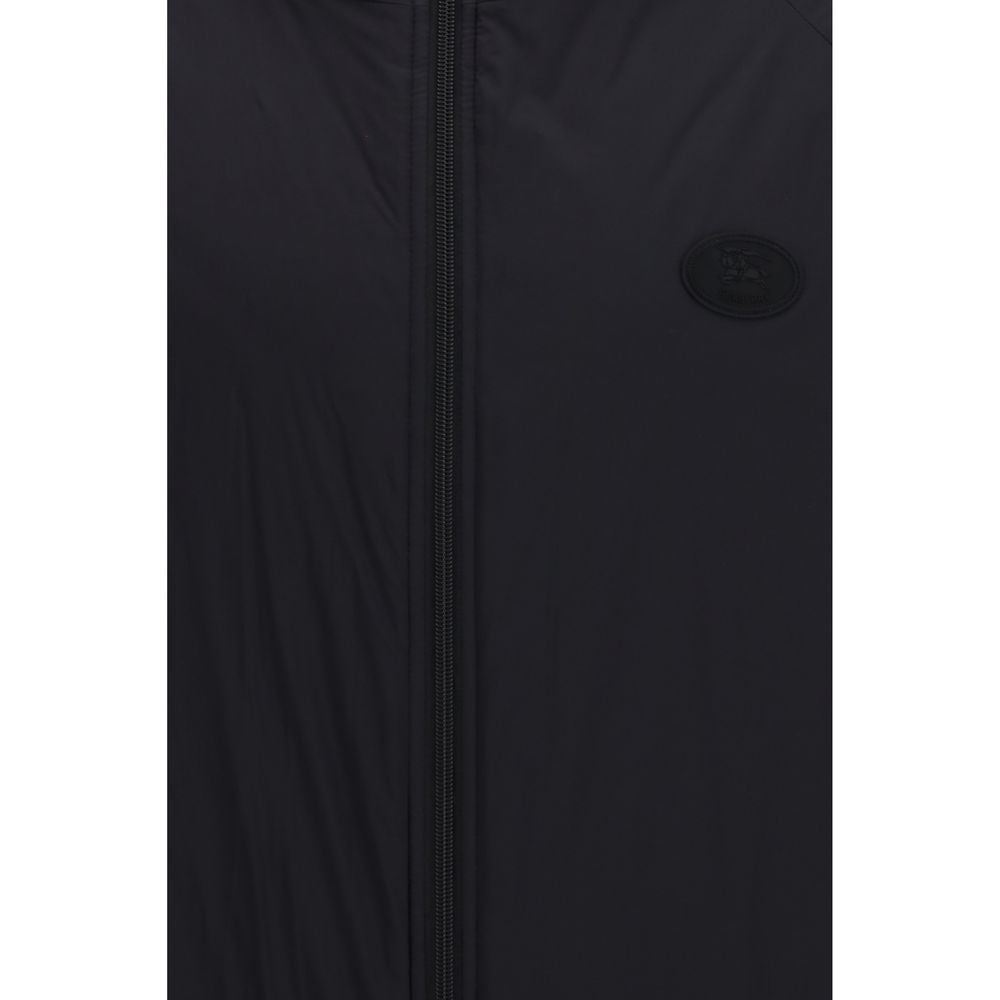 Elevate your style with the Burberry Black Nylon Shell Jacket, a masterclass in luxury and comfort, crafted from lightweight ripstop nylon for the discerning individual.