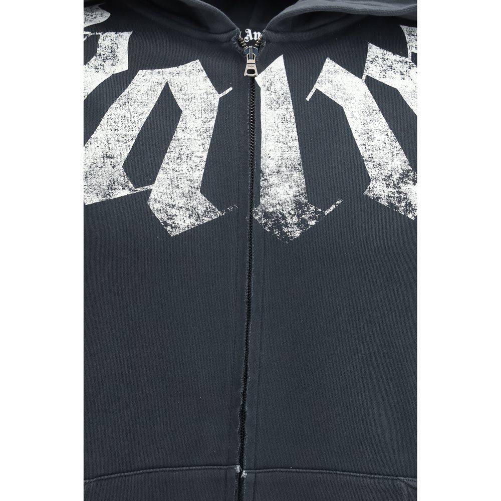 Indulge in the Palm Angels Black Cotton Sweatshirt, a masterpiece of relaxed elegance, crafted from soft cotton for unparalleled comfort and a versatile streetwear aesthetic.