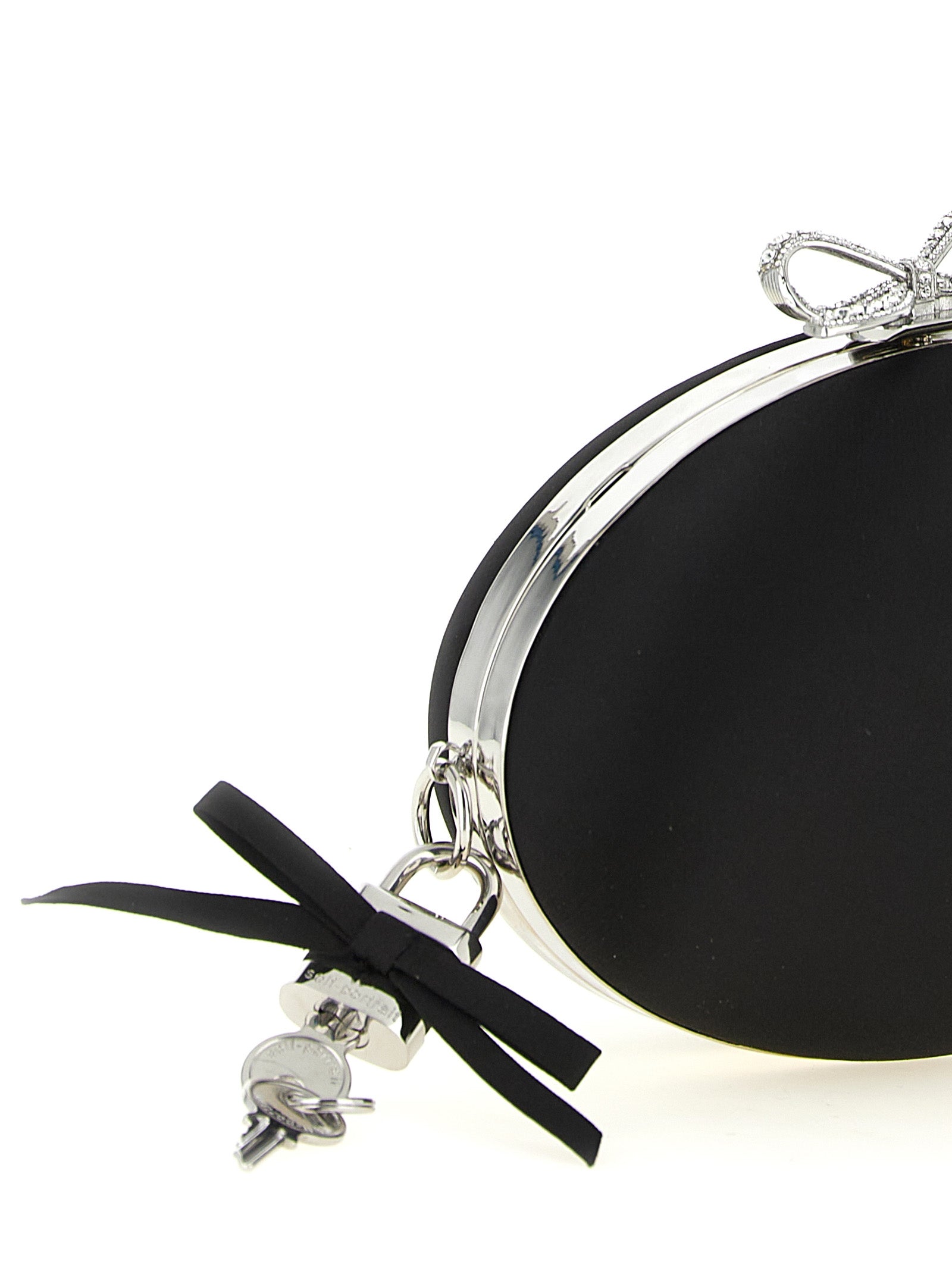 Elevate your evening allure with the Self-Portrait Black Satin Oval Clutch, a masterpiece of structured elegance and refined glamour, perfect for any sophisticated occasion.