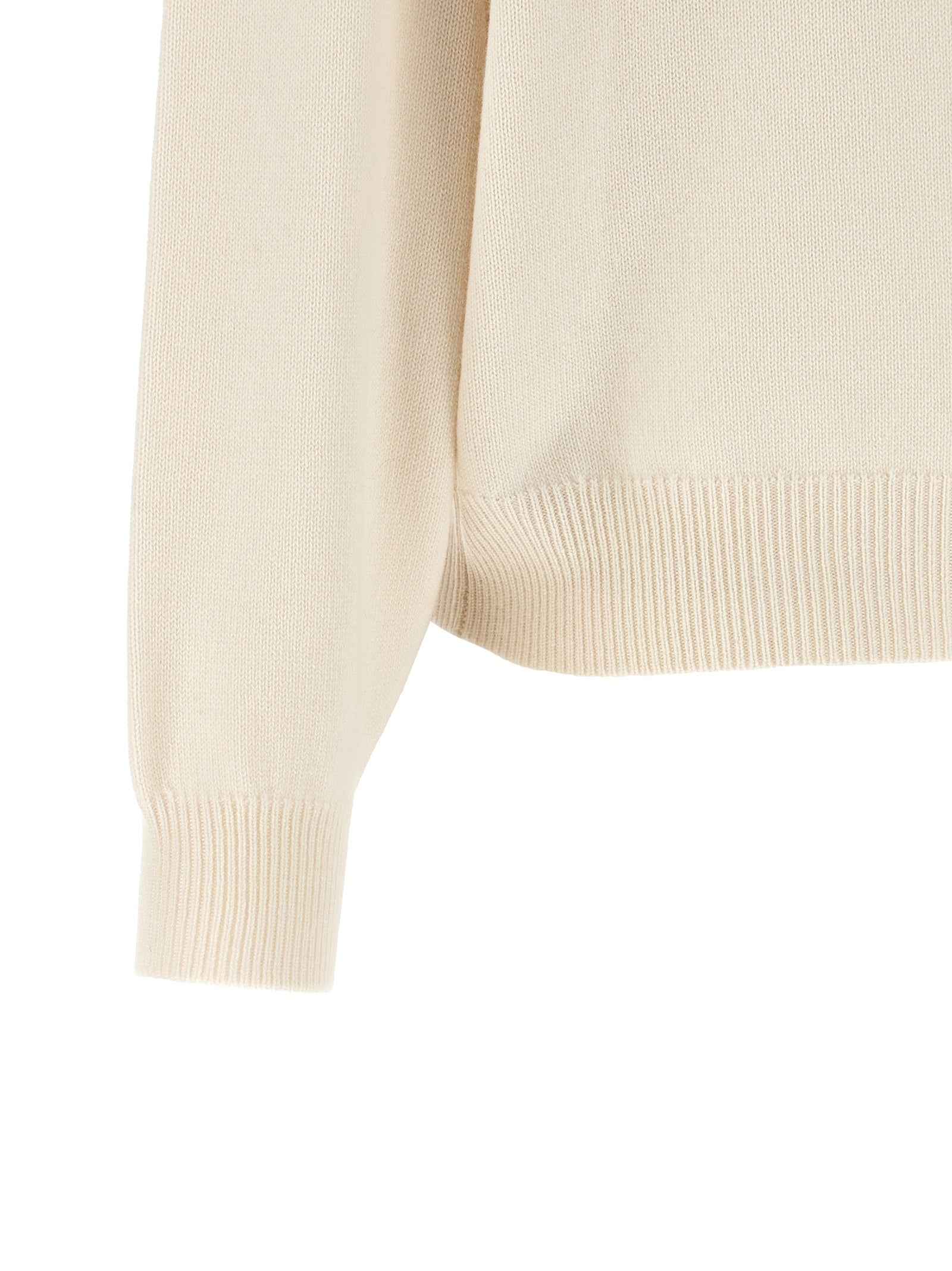 Indulge in the elegance of Brunello Cucinelli's White Cashmere Cardigan, where exquisite craftsmanship meets luxurious comfort, redefining sophistication for the discerning.