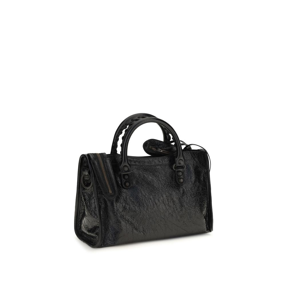 Indulge in the exquisite Balenciaga Black Lamb Ovis Aries Handbag, a masterpiece of soft Arena lambskin leather, merging urban elegance with timeless sophistication.