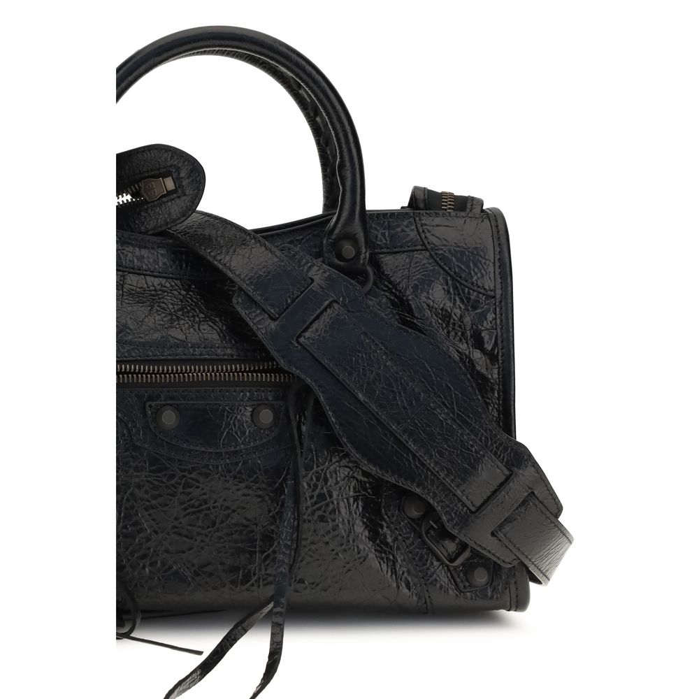 Indulge in the Balenciaga Black Lamb Ovis Aries Handbag, a masterpiece of soft Arena lambskin leather, where urban elegance meets timeless sophistication.