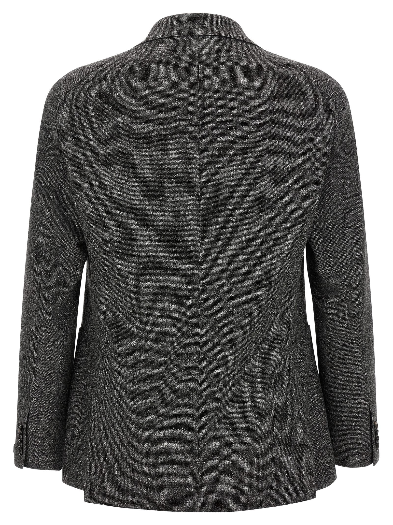 Elevate your wardrobe with the Tagliatore Gray Virgin Wool Blazer, a masterpiece of Italian tailoring that embodies sophistication and timeless elegance.