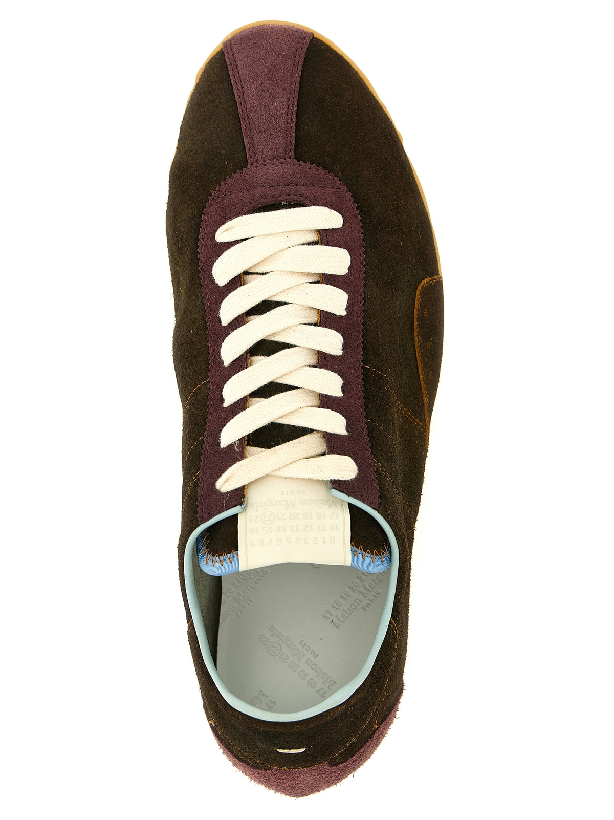 Elevate your style with Maison Margiela's Brown Calfskin Athletic Sneakers, where artisanal craftsmanship meets luxurious design for the discerning individual.