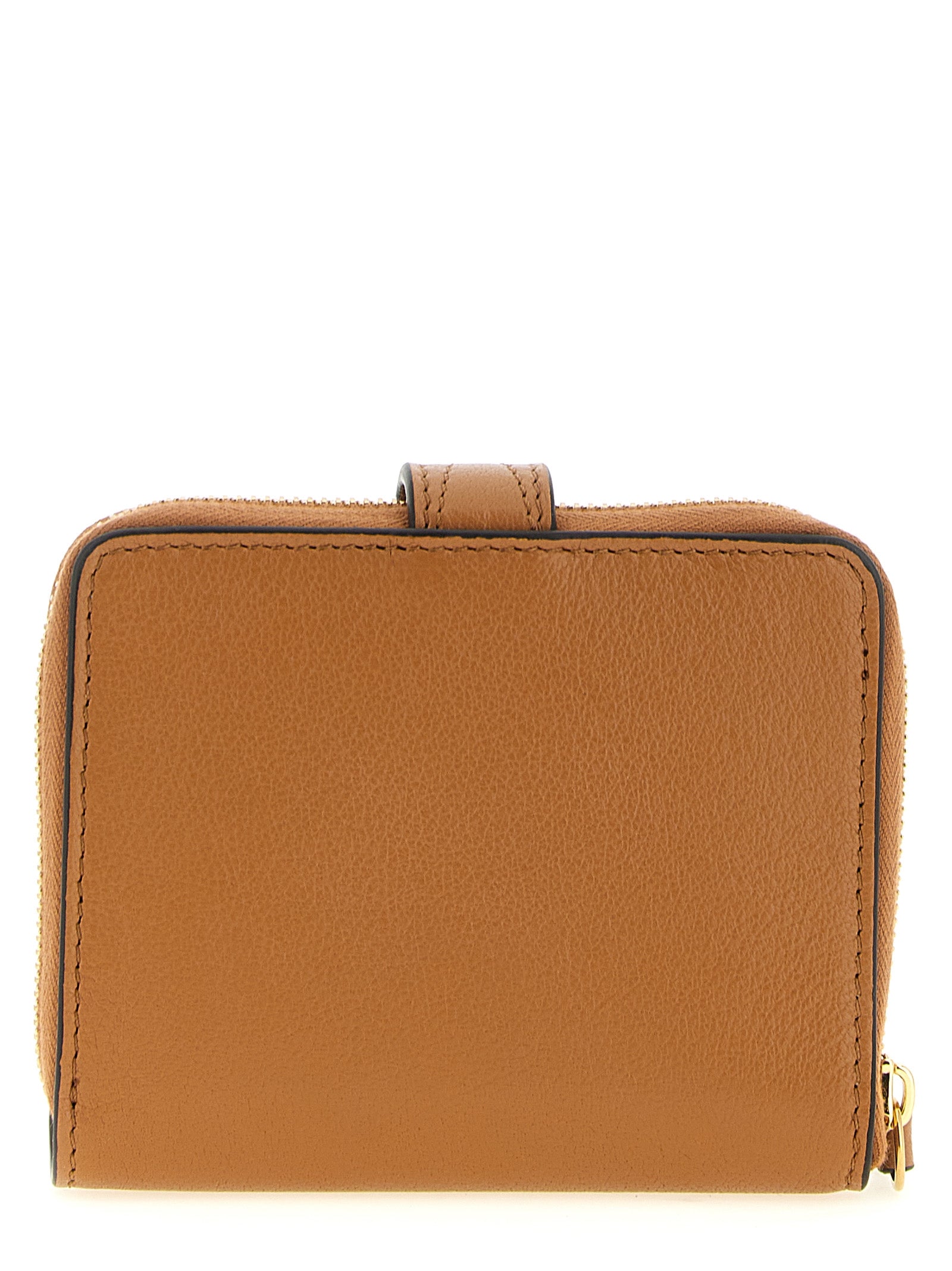 Experience the exquisite allure of the Chloé Brown Buffalo Leather Cardholder, a timeless blend of elegance and functionality, crafted for the discerning individual.