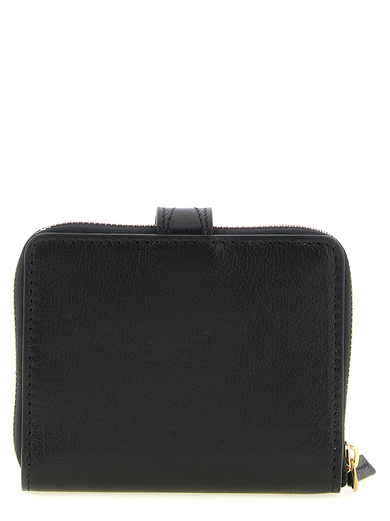 Discover the Chloé Black Buffalo Leather Cardholder, a symbol of exquisite craftsmanship and timeless elegance, perfect for those who appreciate luxury and sophistication.