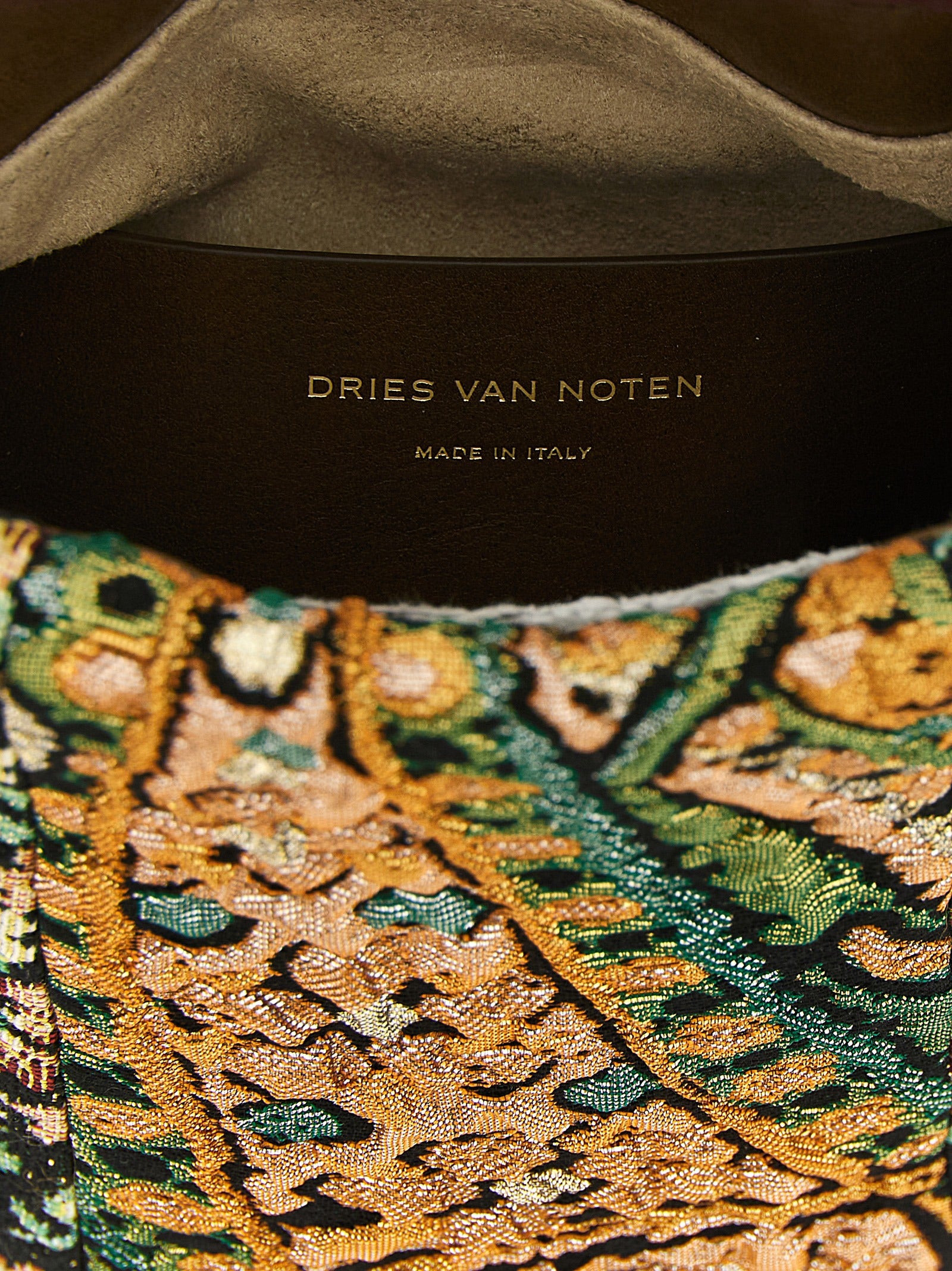 Indulge in the opulence of the Dries Van Noten Crispino handbag, a masterpiece of jacquard fabric adorned with floral motifs, perfect for elevating any ensemble.