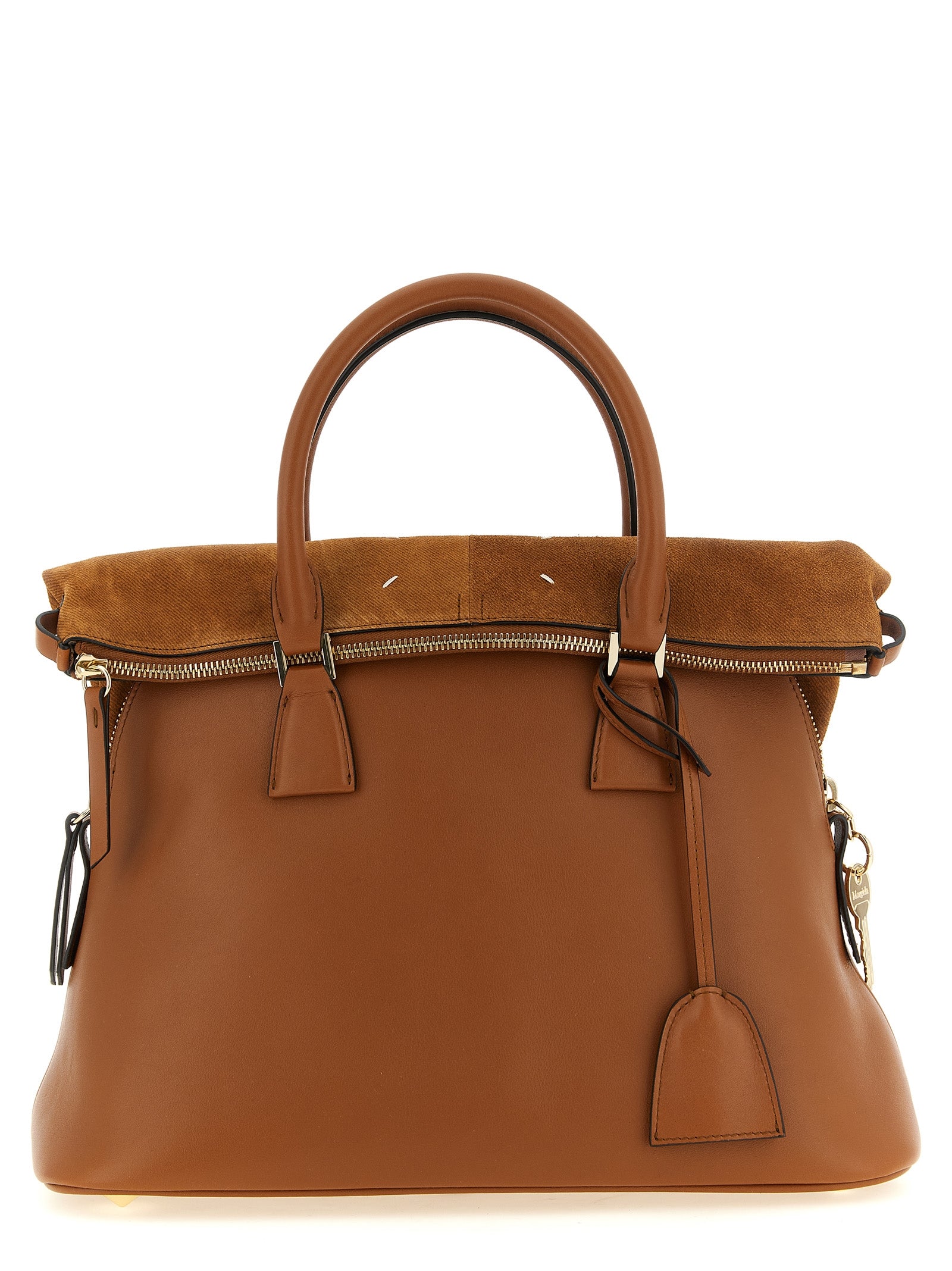 Discover the Maison Margiela ‘5AC Soft’ shoulder bag, a masterful blend of calfskin and suede, embodying sophistication and deconstruction for the discerning individual.