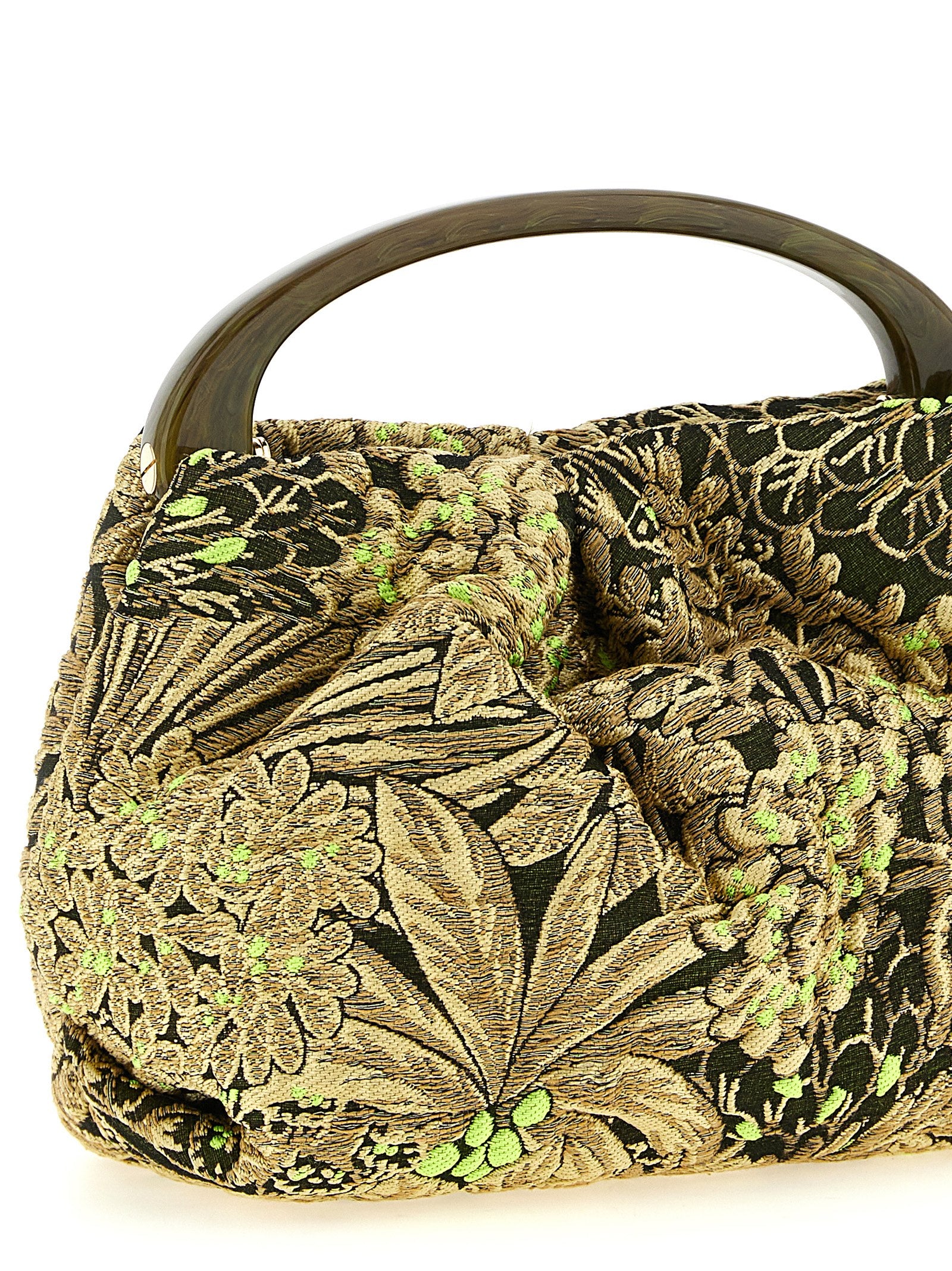Discover the Dries Van Noten ‘Crisp’ small handbag, a masterpiece of eclectic design and luxurious jacquard, perfect for those who embrace elegance and individuality.