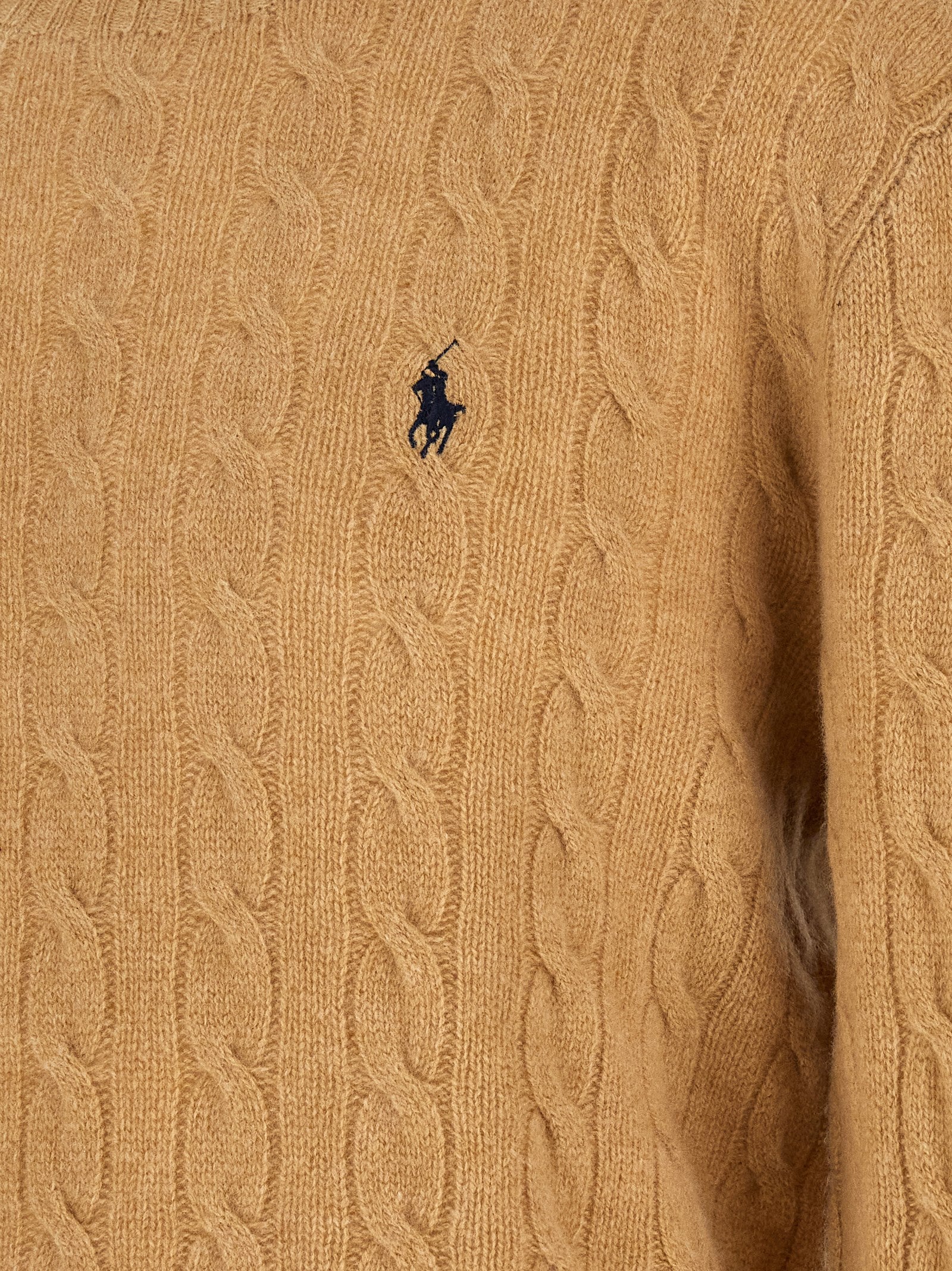 Indulge in the timeless elegance of the Polo Ralph Lauren Beige Wool Cardigan, a luxurious blend of wool and cashmere that embodies sophistication and comfort.