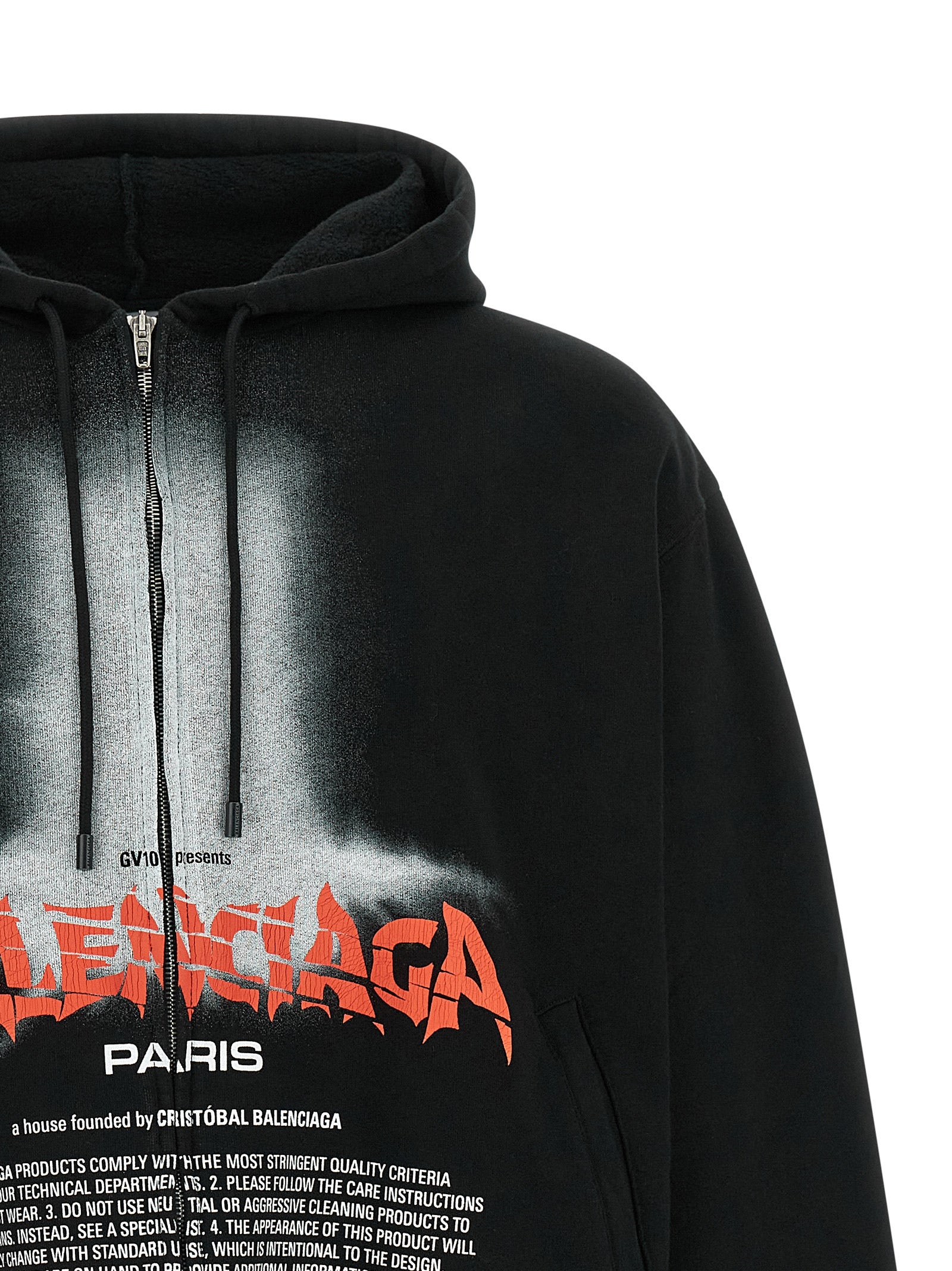 Elevate your wardrobe with the Balenciaga Black Cotton Sweatshirt, a bold statement of modern streetwear crafted from luxurious cotton, embodying contemporary elegance and daring design.