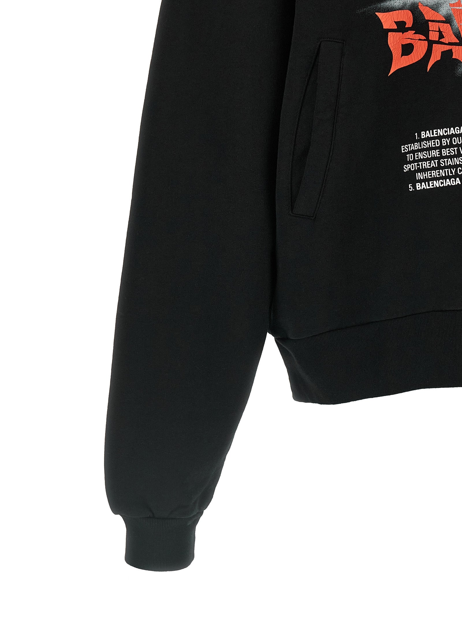 Elevate your wardrobe with the Balenciaga Black Cotton Sweatshirt, a statement of modern luxury, featuring an oversized silhouette and striking graphic for the discerning individual.