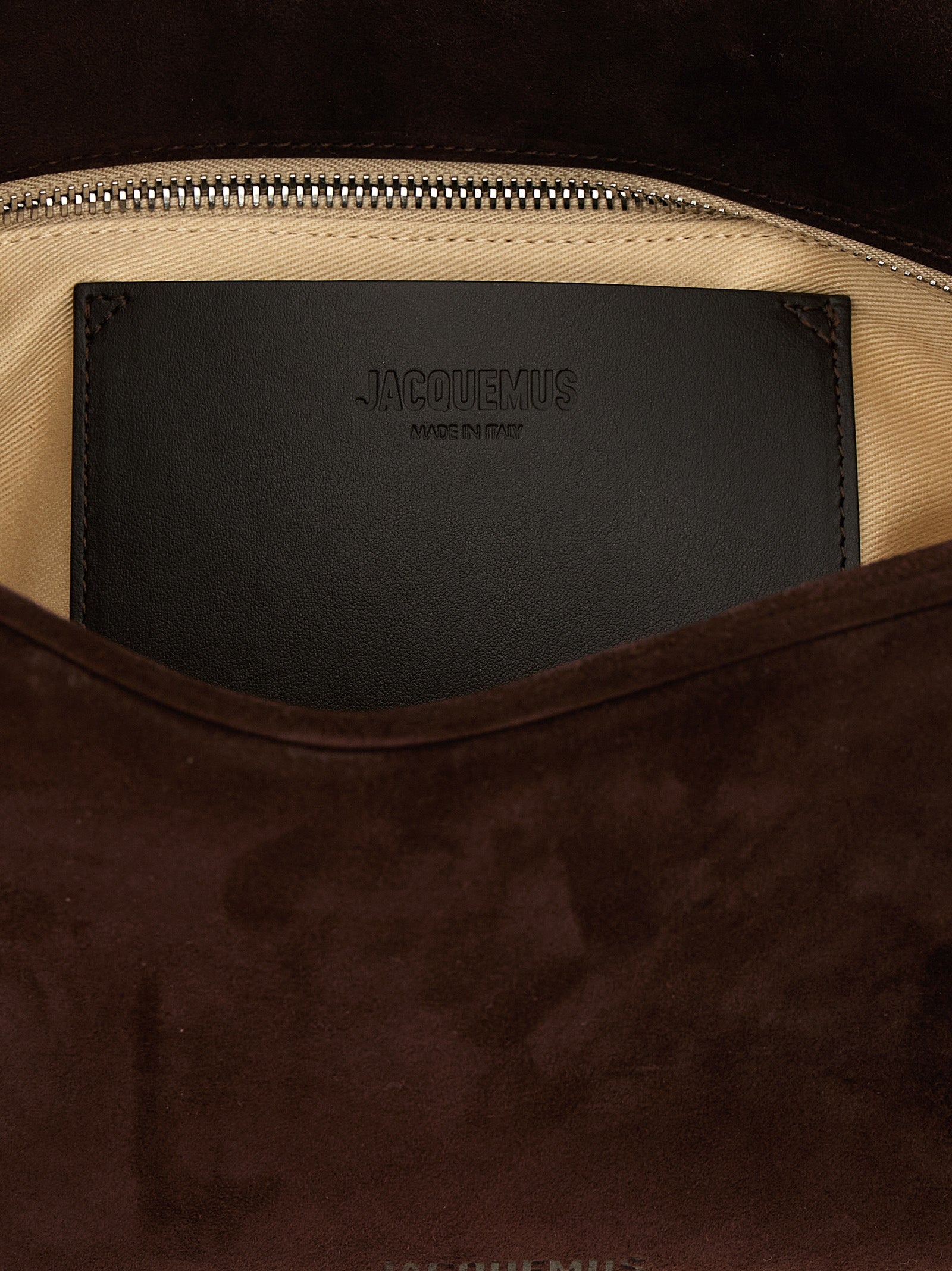 Indulge in the exquisite Jacquemus Brown Calfskin Shoulder Bag, a masterpiece of luxurious craftsmanship and bold design, perfect for the discerning fashion connoisseur.