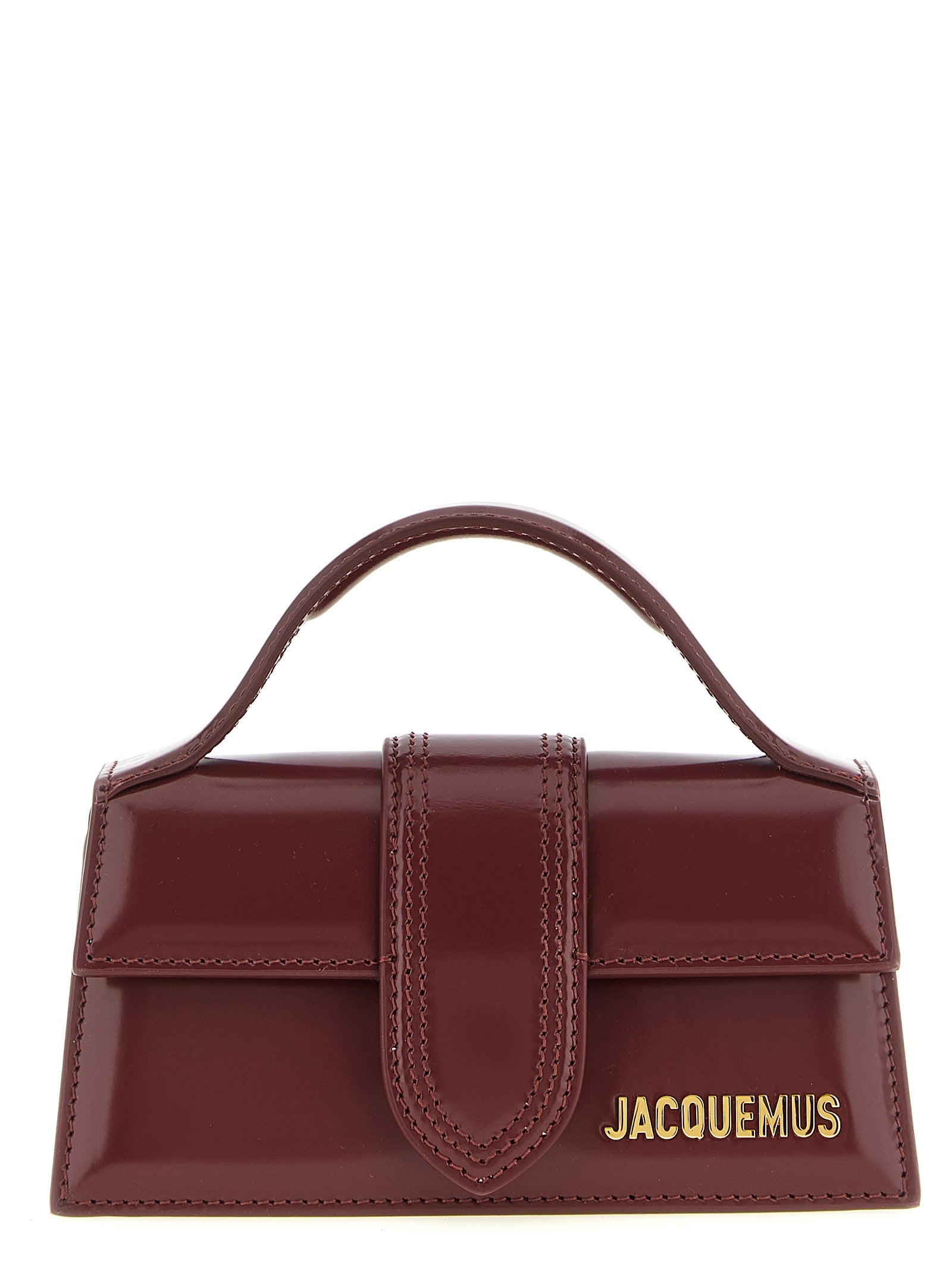 Discover the Jacquemus Bordeaux Calfskin Handbag, a geometric masterpiece of exquisite craftsmanship and luxurious design, perfect for the discerning fashionista.