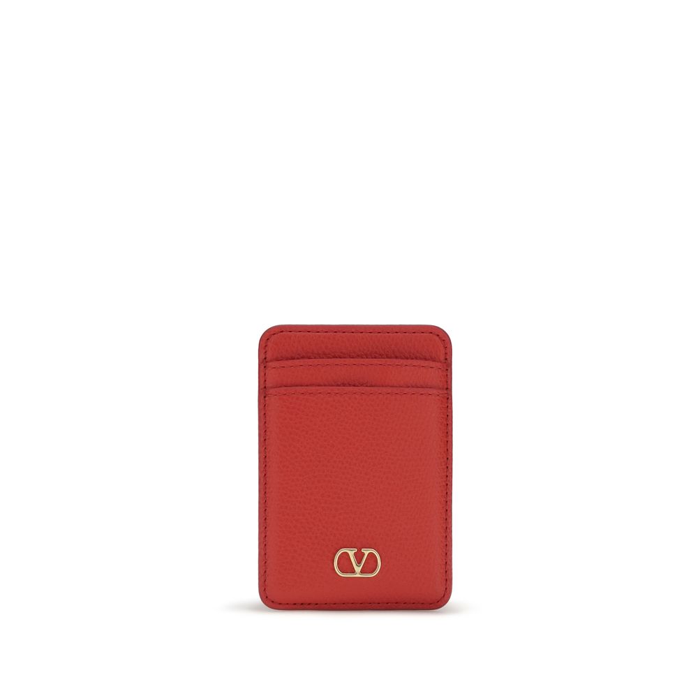 Indulge in the exquisite Valentino Garavani Red Calf Leather Bos Taurus Wallet, a masterpiece of craftsmanship featuring the iconic VLogo Signature, perfect for the discerning individual.