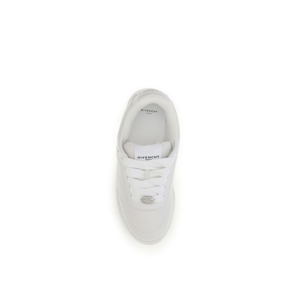 Experience the allure of Givenchy's White Calf Leather Bos Taurus Sneakers, where exquisite craftsmanship meets contemporary streetwear elegance, perfect for discerning tastes.