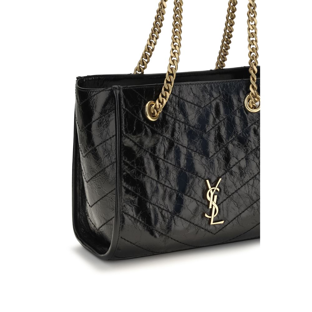 Indulge in the Saint Laurent Black Calf Leather Bos Taurus Shoulder Bag, a masterpiece of vintage craftsmanship and timeless elegance, perfect for the discerning individual.