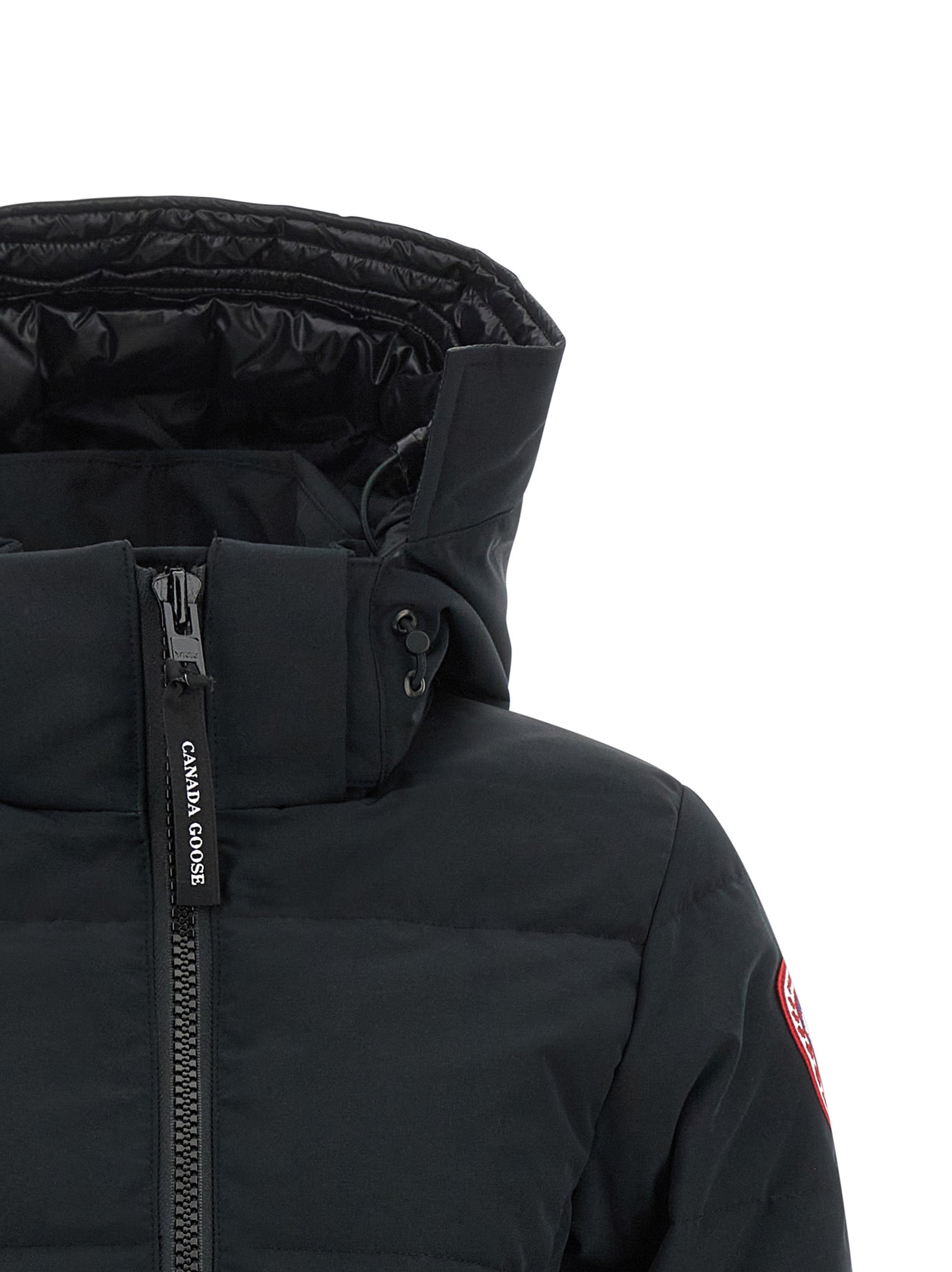 Elevate your winter wardrobe with the Canada Goose Chelsea Parka, crafted from water-repellent Arctic Tech fabric and filled with sustainably sourced duck down for unparalleled warmth and style.