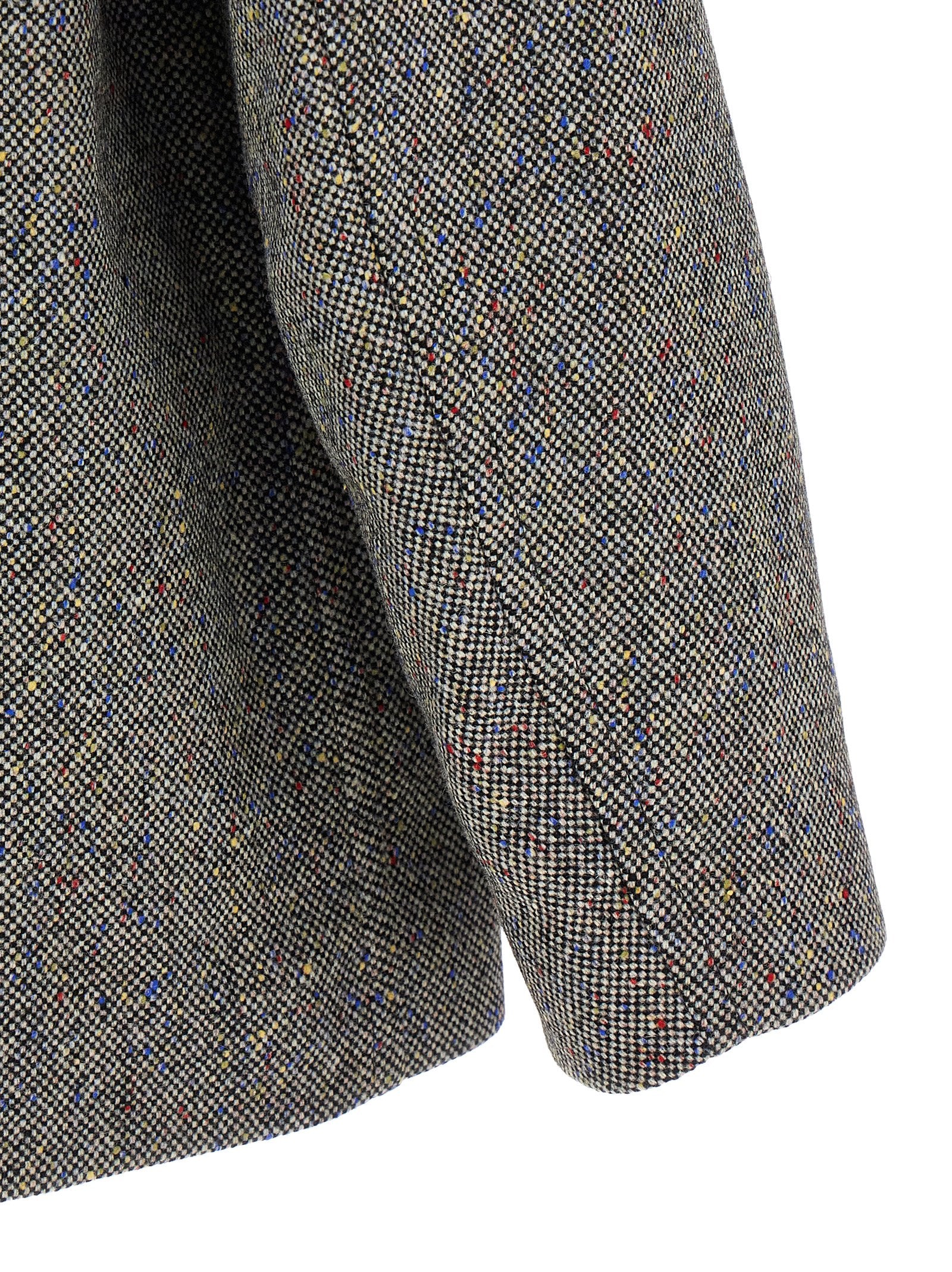 Elevate your style with the Dries Van Noten Gray Wool Coat, a luxurious blend of craftsmanship and sophistication, perfect for the discerning trendsetter.