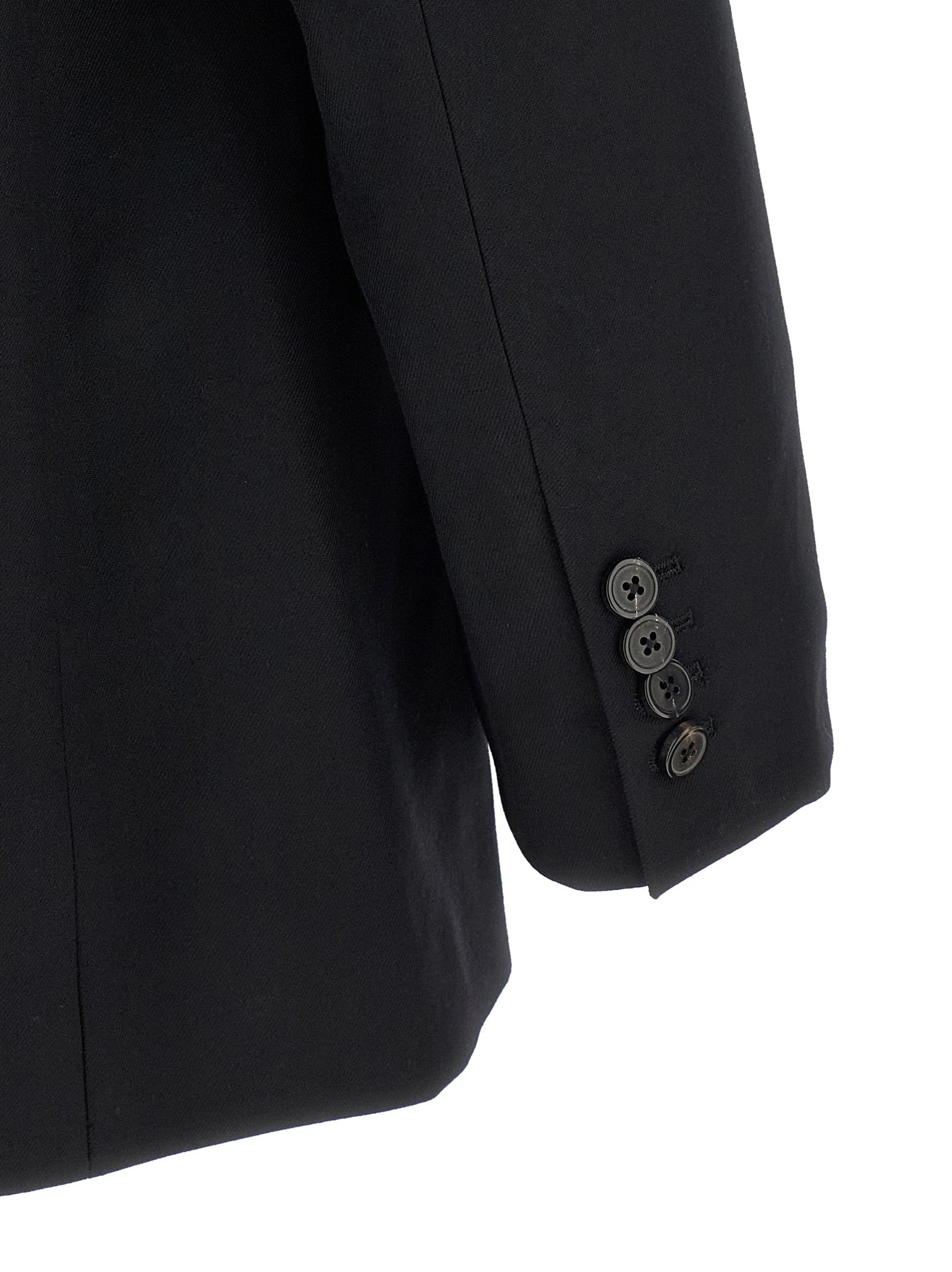 Elevate your style with the Dries Van Noten Black Wool Blazer, a masterful blend of contemporary design and luxurious craftsmanship, perfect for the discerning individual.