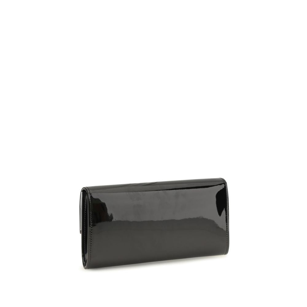 Indulge in the elegance of the Jimmy Choo Black Calf Leather Bos Taurus Wallet, a masterpiece of Italian craftsmanship that embodies luxury and sophistication for the discerning individual.