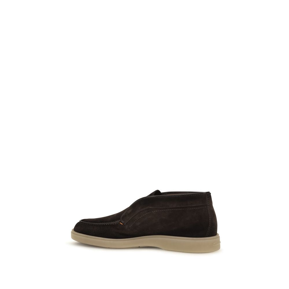 Elevate your elegance with Santoni's Brown Suede Leather Slip-On Loafers, crafted from sumptuous suede for unparalleled comfort and style, embodying timeless luxury.