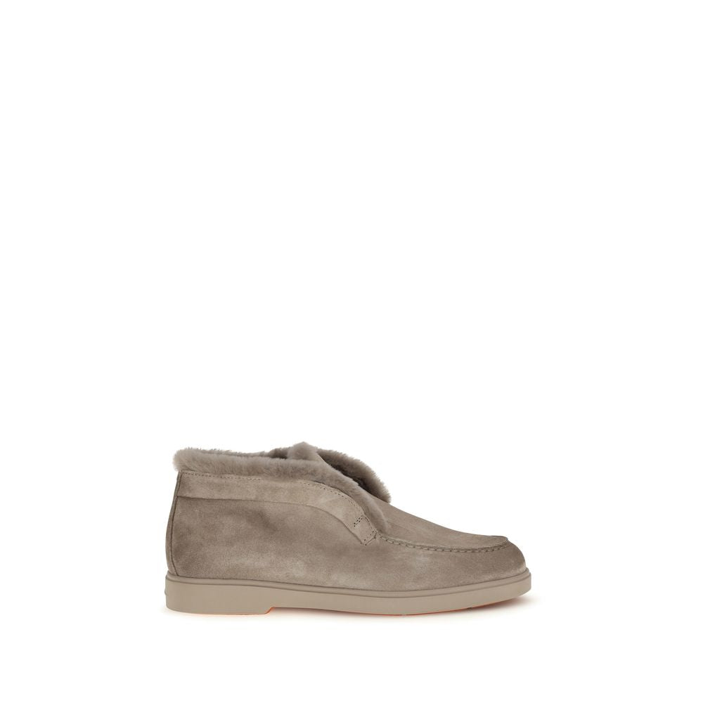 Indulge in the exquisite allure of Santoni's Beige Faux Fur Ankle Boots, where soft calf suede meets cruelty-free luxury, elevating your style for the season.