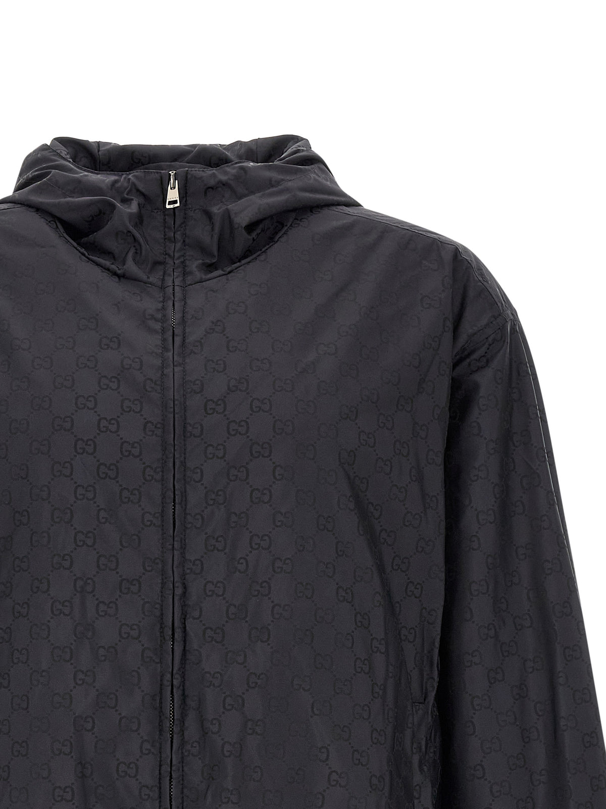 Elevate your wardrobe with the Gucci Black Polyamide Shell Jacket, a masterpiece of Italian craftsmanship that redefines luxury and sophistication for any occasion.