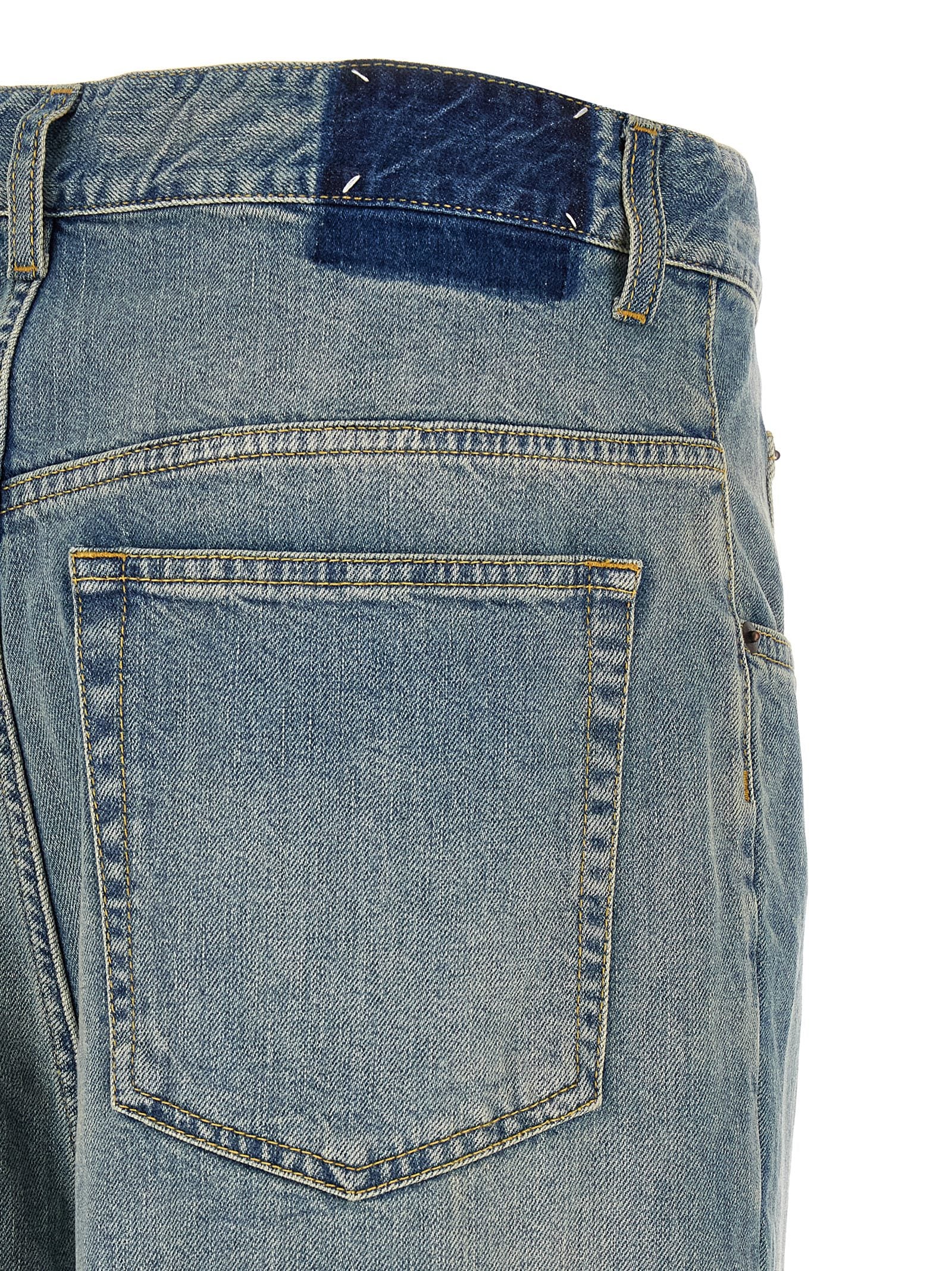 Discover the Maison Margiela Blue Cotton Straight-Leg Jeans, a bold fusion of avant-garde design and luxurious craftsmanship, perfect for making a daring style statement.