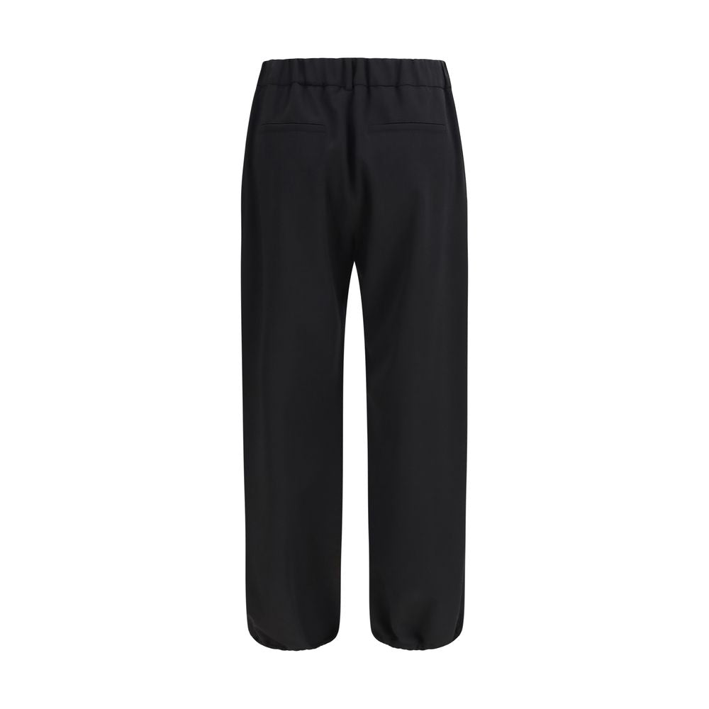 Indulge in the exquisite Burberry Black Wool Oves Aries Joggers, crafted from luxurious Merino wool, embodying timeless elegance and sophistication for the discerning individual.