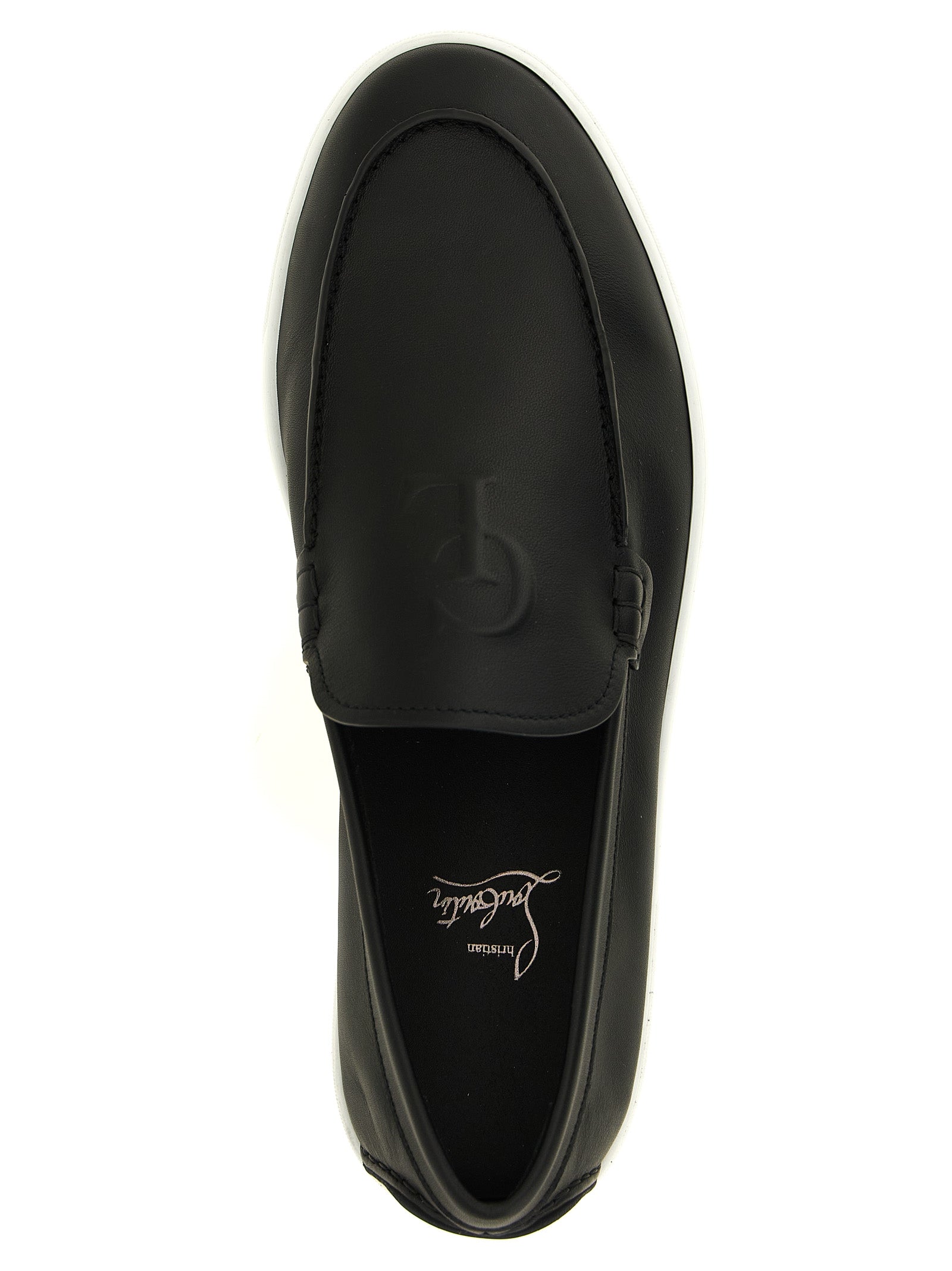 Elevate your style with Christian Louboutin's Black Calfskin Slip-On Loafers, a seamless blend of elegance and modernity, crafted for the discerning individual.