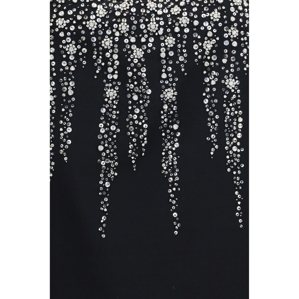 Indulge in the exquisite Valentino Garavani Black Wool Oves Aries Cocktail Dress, a masterpiece of floral embroidery and silk blend, perfect for elevating your elegance.