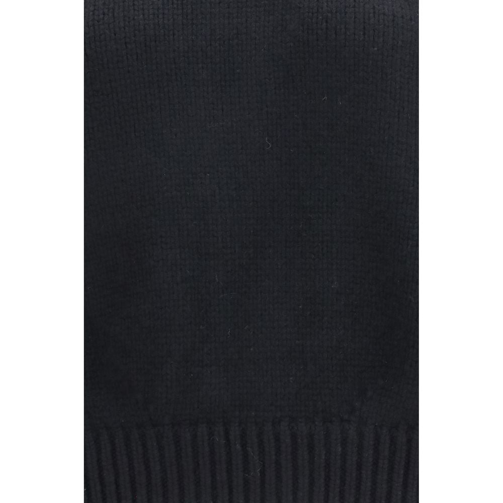 Indulge in the refined elegance of the Khaite Black Cashmere Sweatshirt, crafted from luxurious Italian cashmere, embodying sophisticated allure and timeless style.