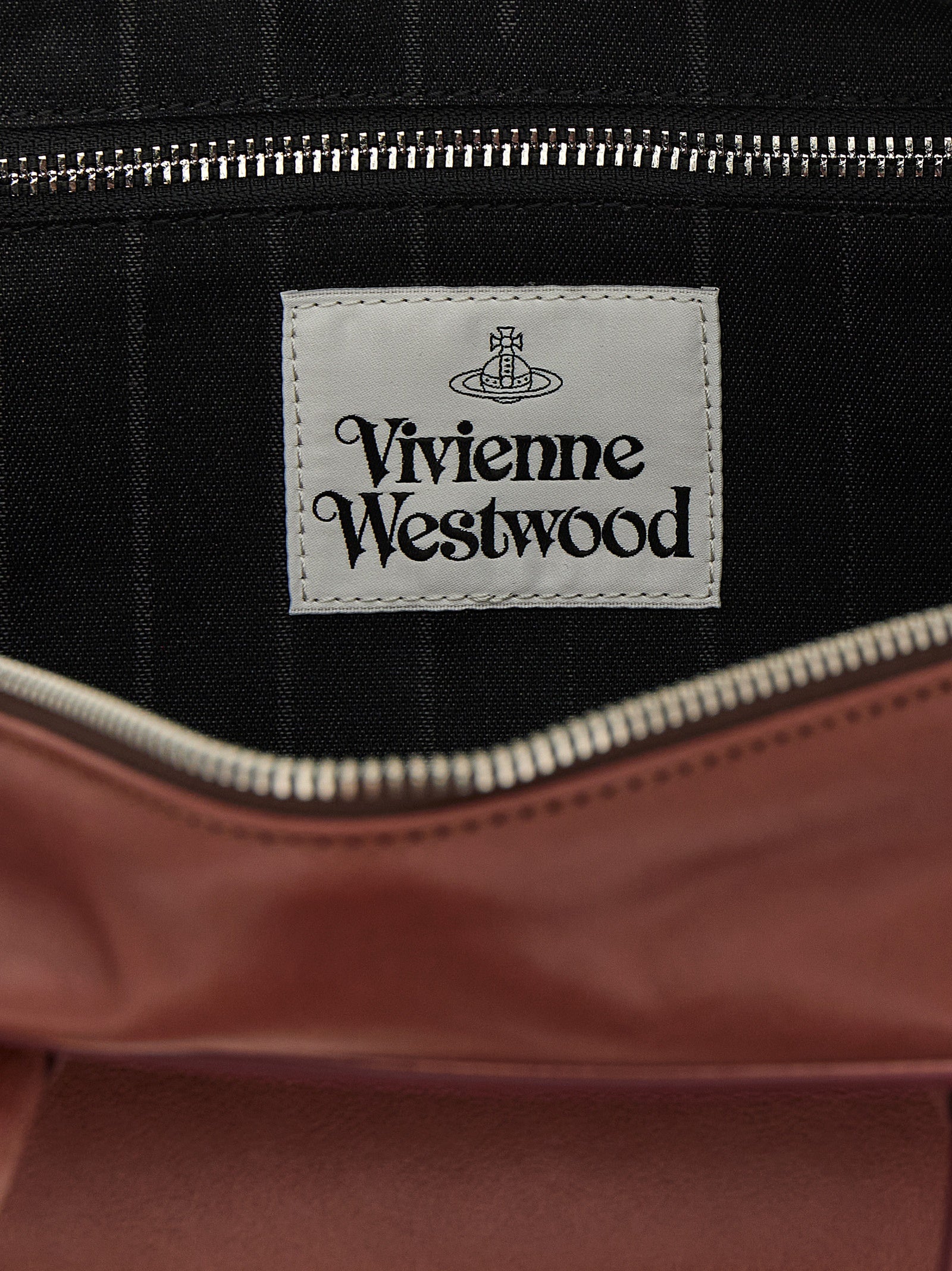 Discover the Vivienne Westwood Shirley Small shoulder bag, a luxurious calfskin masterpiece that embodies timeless elegance and sophisticated allure.