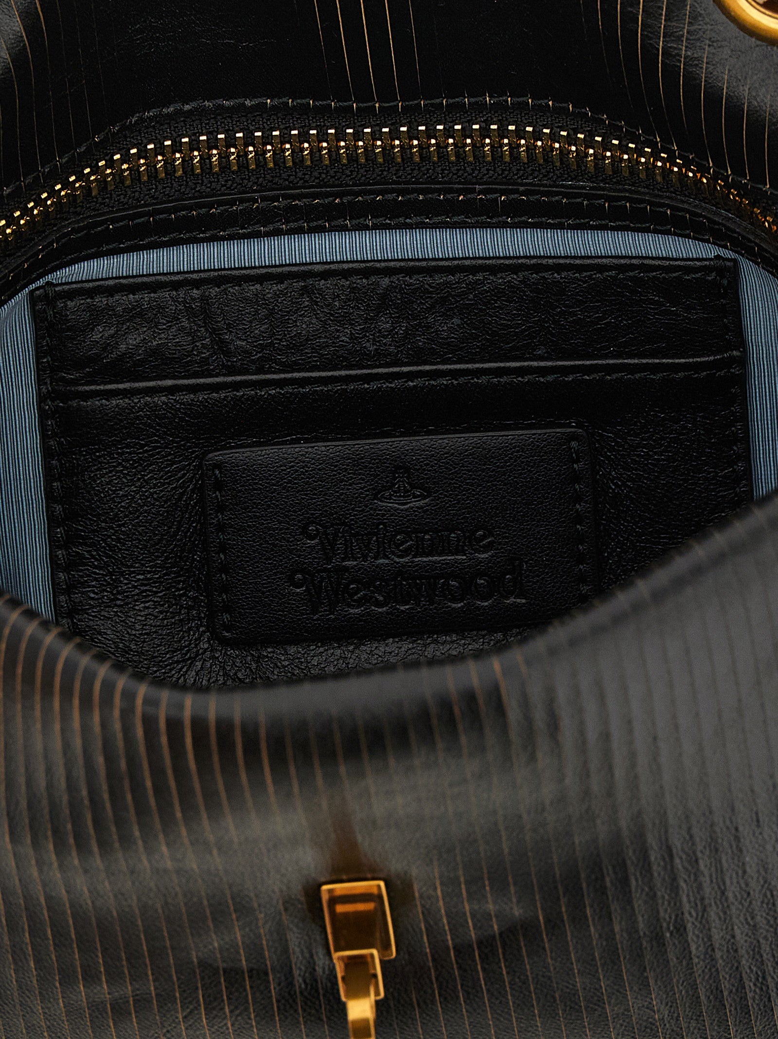 Discover the Vivienne Westwood Black Calfskin Shoulder Bag, a symbol of elegance and artistry, crafted in Italy from luxurious calf leather for the discerning individual.