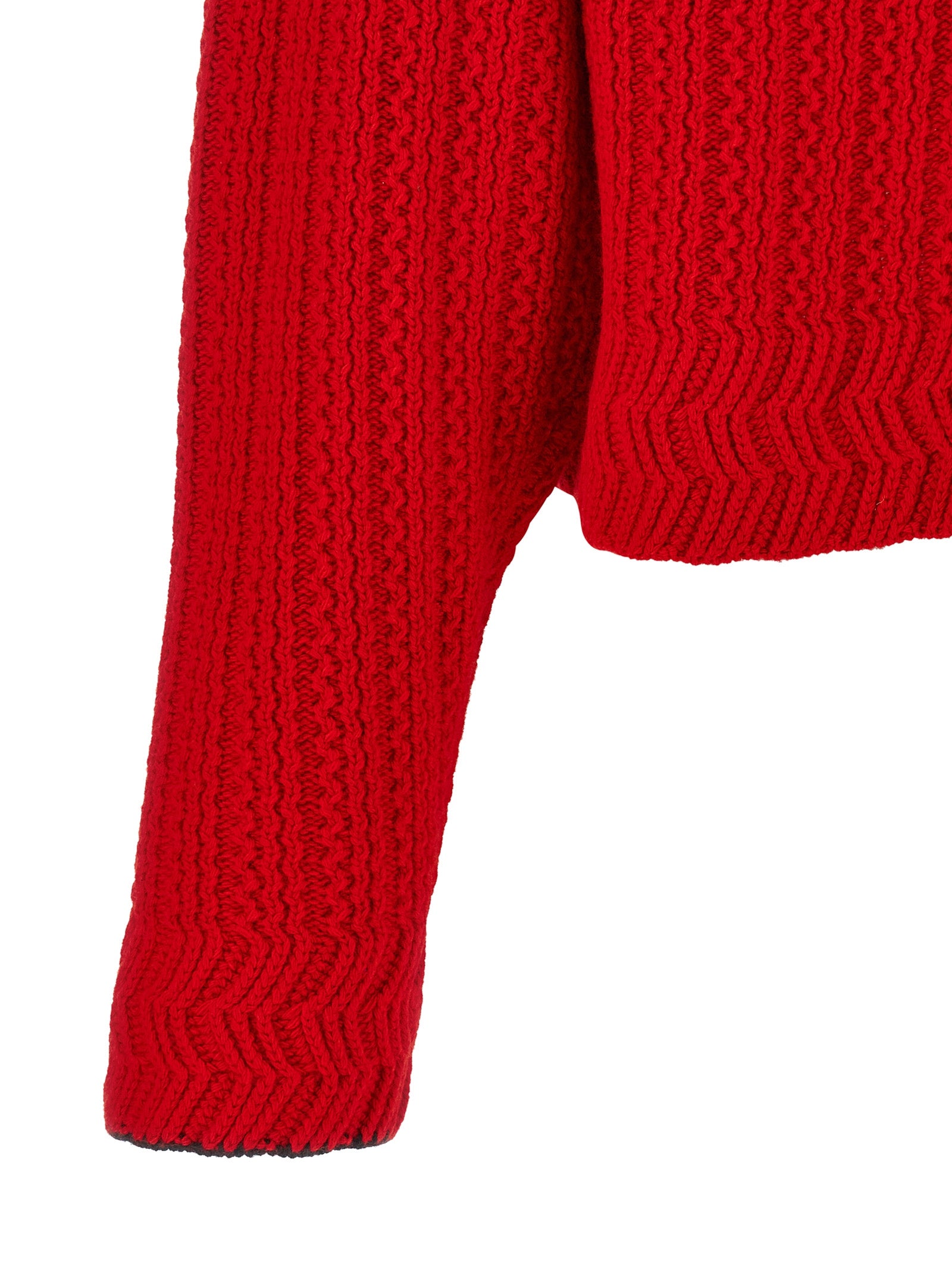 Indulge in the Chloé Red Wool Cardigan, a luxurious blend of 70% wool and 30% cashmere, exuding sophistication and warmth for the discerning fashion connoisseur.