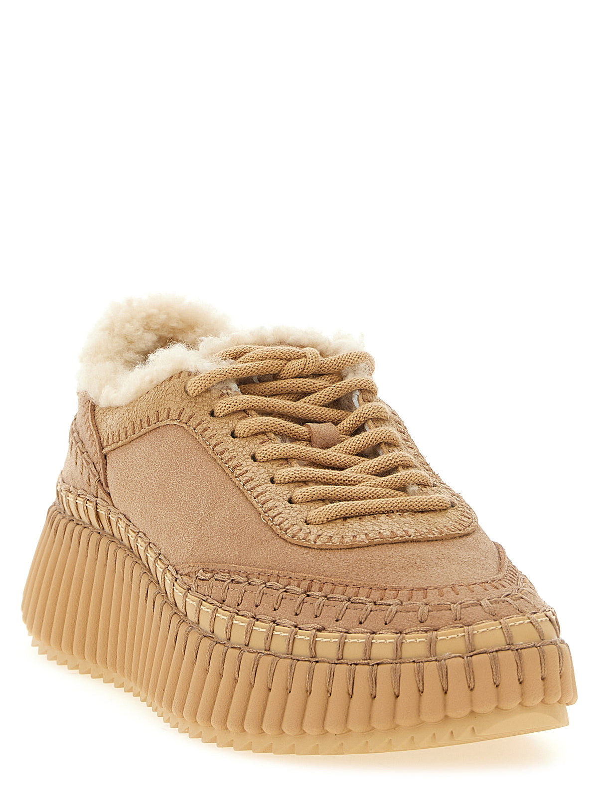 Step into a realm of elegance with Chloé's Nama Beige Lambskin Chunky Sneakers, where luxurious craftsmanship meets sustainable sophistication for the discerning individual.