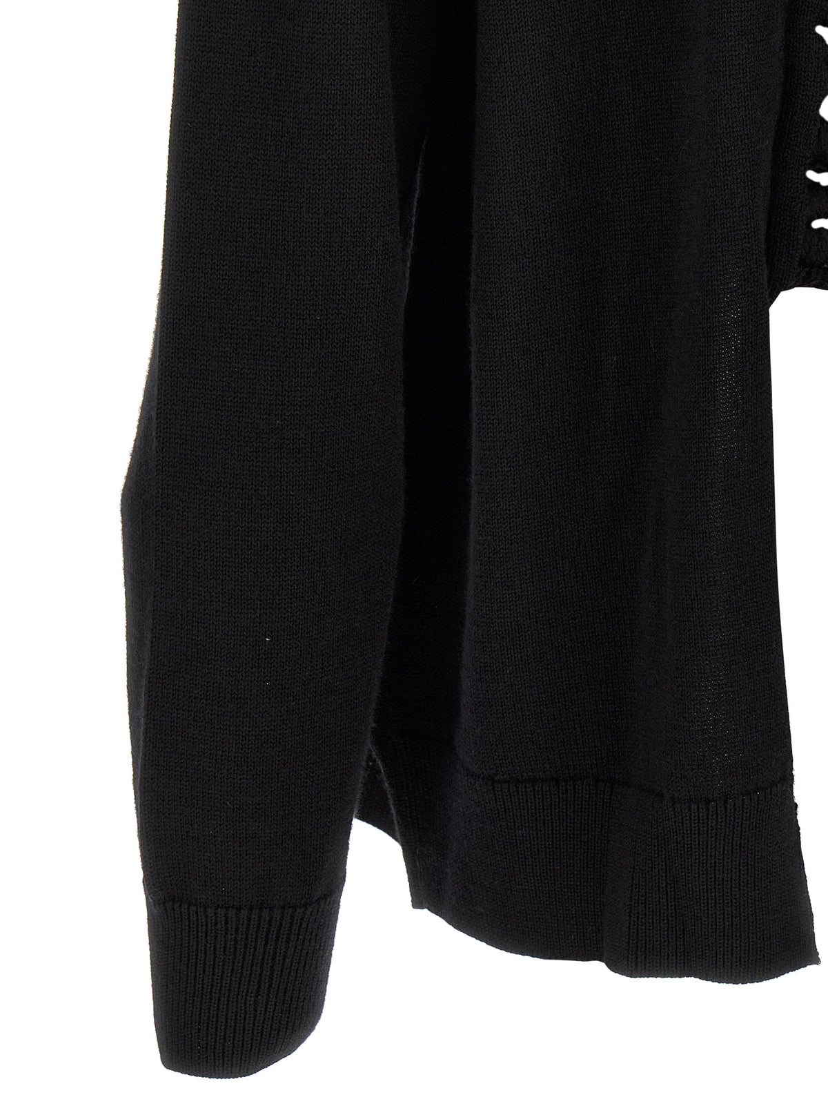 Discover the exquisite Comme Des Garçons Black Wool Cardigan, a masterpiece of avant-garde design and luxurious craftsmanship, perfect for the discerning wardrobe.
