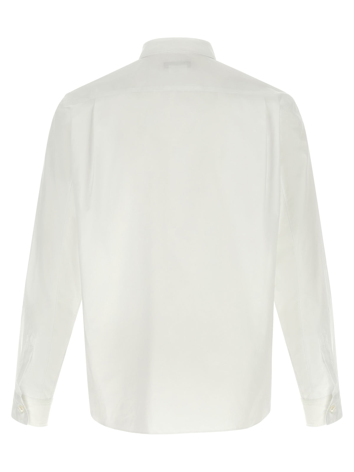 Elevate your wardrobe with the Comme Des Garçons White Cotton Blouse, a masterful blend of avant-garde design and classic tailoring, celebrating exquisite craftsmanship.