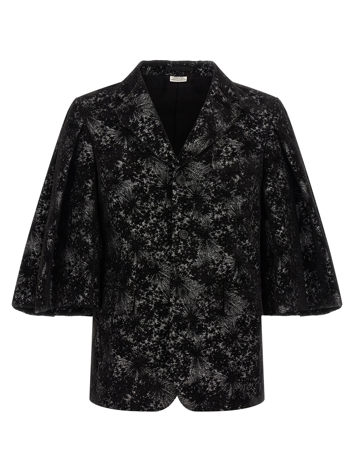 Discover the Comme Des Garçons Black Polyester Blazer, a masterpiece of avant-garde design and craftsmanship, perfect for those who embrace luxury and individuality.