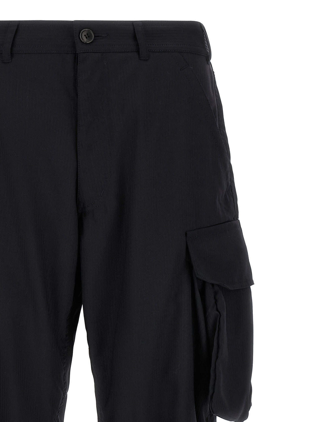 Experience the allure of Comme Des Garçons Blue Polyester Cargo Pants, where innovative design meets refined craftsmanship, perfect for the discerning individual.
